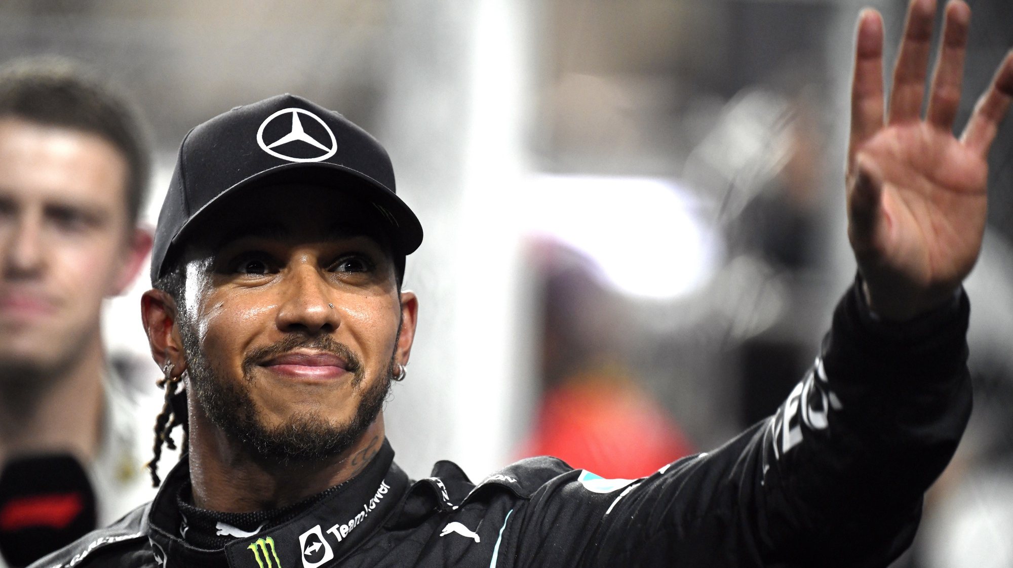epa11118617 British Formula One driver Lewis Hamilton of Mercedes-AMG Petronas waves at parc ferme after taking the pole position in the qualifying for the 2021 Formula One Grand Prix of Saudi Arabia at the Jeddah Corniche Circuit in Jeddah, Saudi Arabia, 04 December 2021 (reissued 01 February 2024). British driver Lewis Hamilton will leave Mercedes-AMG Petronas after the upcoming 2024 season and sign with Scuderia Ferrari from 2025 on. The 39-year-old seven-times world champion&#039;s move was announced by Scuderia Ferrari in a statement on 01 February 2024.  EPA/STR *** Local Caption *** 57335517