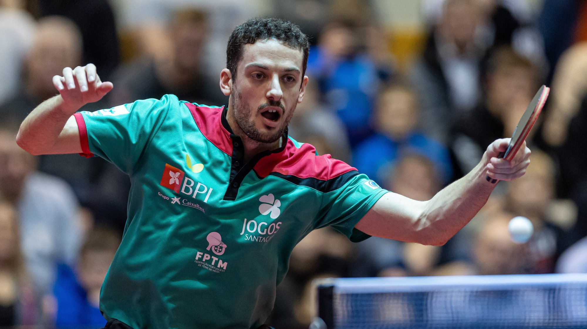 epa10392666 Marcos Freitas of Portugal in action against Samuel Kulczycki of Poland during the Men&#039;s Table Tennis ETTU European Team Championships Qualification match between Poland and Portugal in Poznan, Poland, 06 January 2023.  EPA/Pawel Jaskolka POLAND OUT