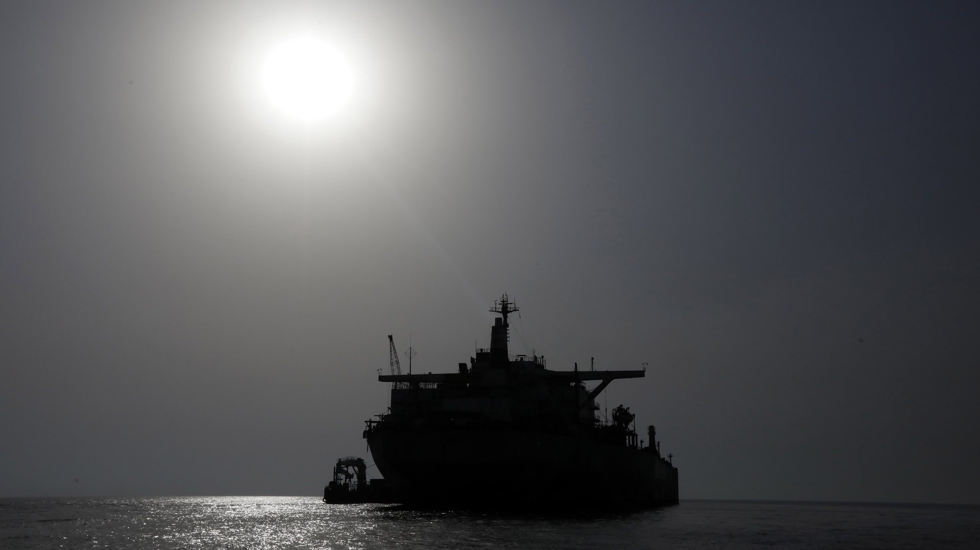 epa10748641 A view shows FSO Safer oil tanker moored in the Red Sea, off the coast of the western Hodeidah province, Yemen, 15 July 2023. The transfer of 1.14 million barrels of oil from the 47-year-old FSO Safer supertanker, stranded off Yemen&#039;s Red Sea coast since 1988, will begin next week after the UN-purchased vessel sailed from Djibouti en route to the Safer site, the United Nations has reported. The Nautica is a super-tanker the UN purchased for taking the crude oil from the decaying FSO Safer. The beleaguered FSO Safer has not undergone maintenance since Yemen&#039;s war broke out in 2015 and was left abandoned off the Houthis-held port of Hodeidah in the Red Sea, posing a serious risk to the environment off the coast of Yemen due to the possibility of it breaking up or catching fire.  EPA/YAHYA ARHAB