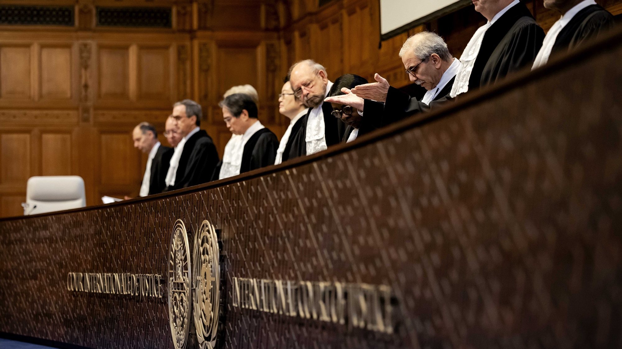 epa11167602 Nawaf Salam (C), President of the Court presides over a hearing at the International Court of Justice (ICJ) on the legal consequences of the Israeli occupation of Palestinian territories, The Hague, the Netherlands, 20 February 2024.  EPA/ROBIN VAN LONKHUIJSEN
