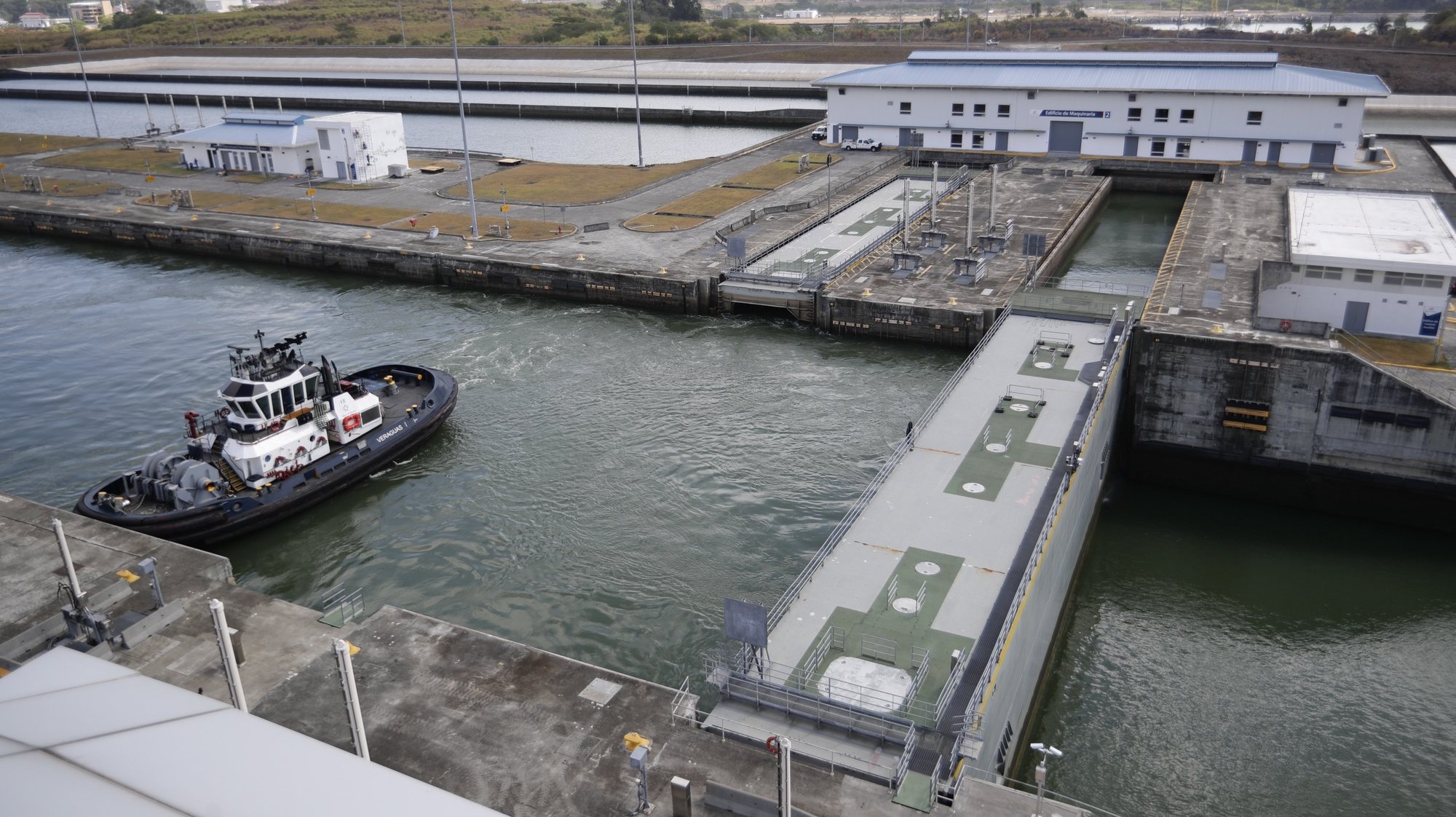 epa10580737 A tugboat maneuvers at the Cocoli locks, inaugurated in 2016, on the Panama Canal in Panama City, Panama, 19 April 2023. The Panama Canal implements from 19 April 2023 its fifth draft restriction for this season on neopanamx ships that only pass through the Panama Canal expansion inaugurated in 2016, due to the low level of at least one of the two artificial lakes that feed the channel as a result of the country&#039;s dry season. Neopanamax ships are three times the size of the vessels that pass through the Panama Canal century-old locks.  EPA/Bienvenido Velasco