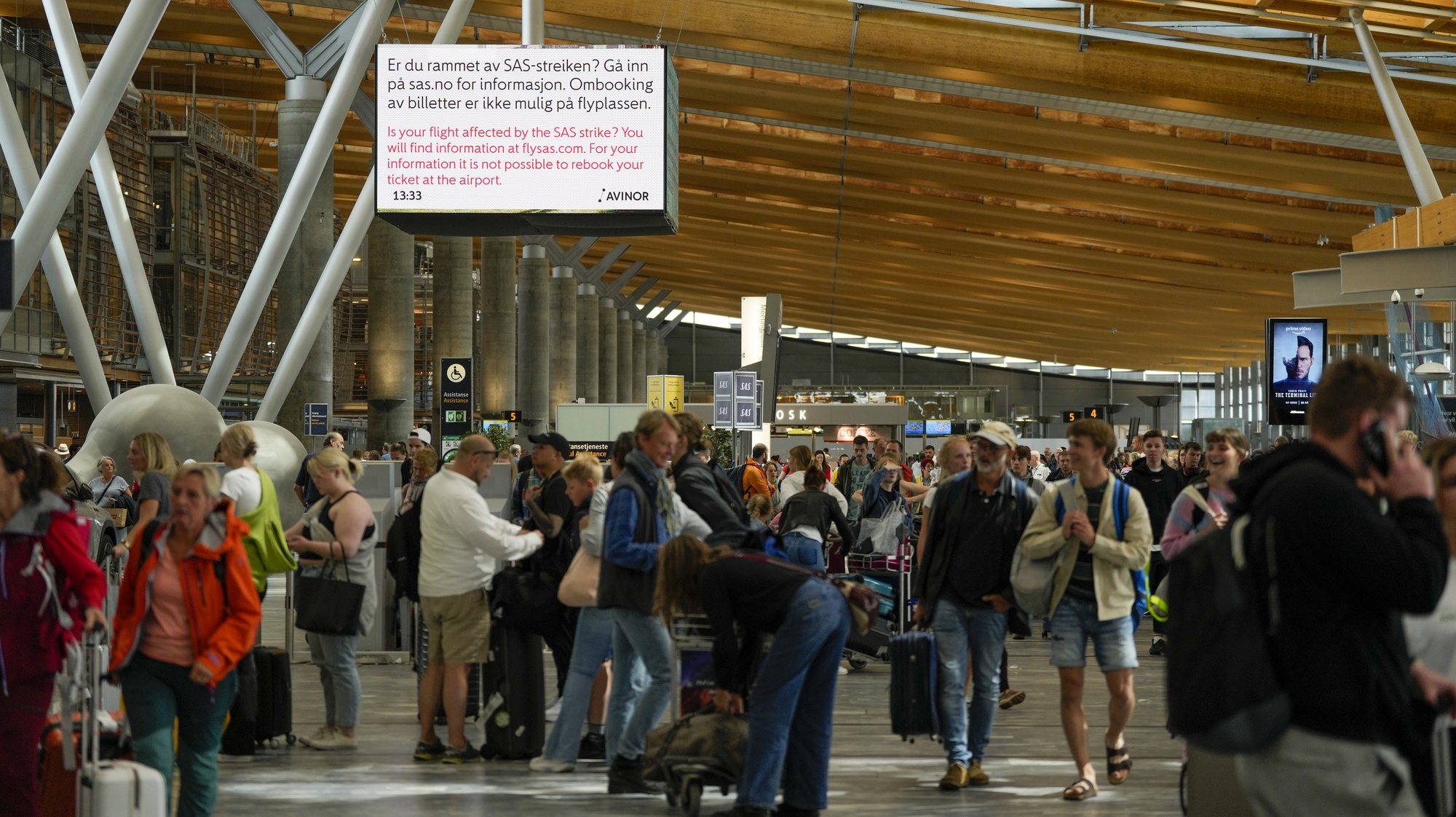 epa10051380 The departure hall at Oslo Gardermoen Airport in Gardermoen, Norway, 04 July 2022. Some 900 Scandinavian Airlines (SAS) pilots in Sweden, Denmark and Norway called for a strike on 04 July as the company and the pilots’ union failed to reach an agreement within the deadline. Pilots, already dissatisfied with working conditions, claim the company refuses to reinstate staff fired during the pandemic, and instead employs new pilots with cheaper agreements.  EPA/BEATE OMA DAHLE  NORWAY OUT