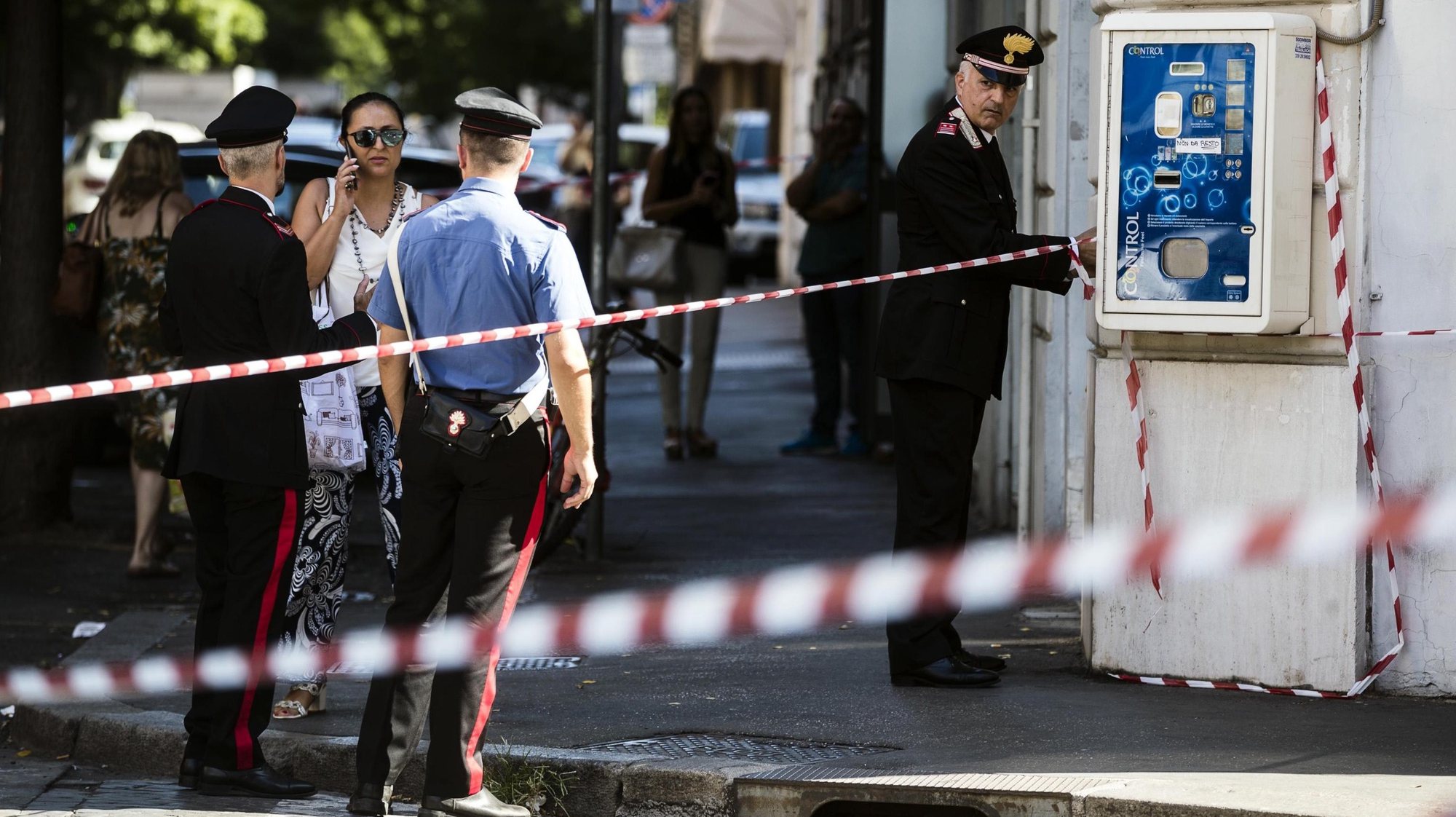 epa09180033 (FILE) - Carabinieri officer and forensic police work a crime scene where Vice Brigadier of Carabinieri Mario Cerciello Rega was shot dead the night before in via Pietro Cossa, Rome, Italy, 26 July 2019 (reissued 06 May 2021). US college students Gabriel Natale-Hjorth and Finnegan Lee Elder were sentenced to life in prison on 05 May 2021 for the 2019 murder of Carabinieri paramilitary police officer Mario Cerciello Rega in Rome.  EPA/ANGELO CARCONI
