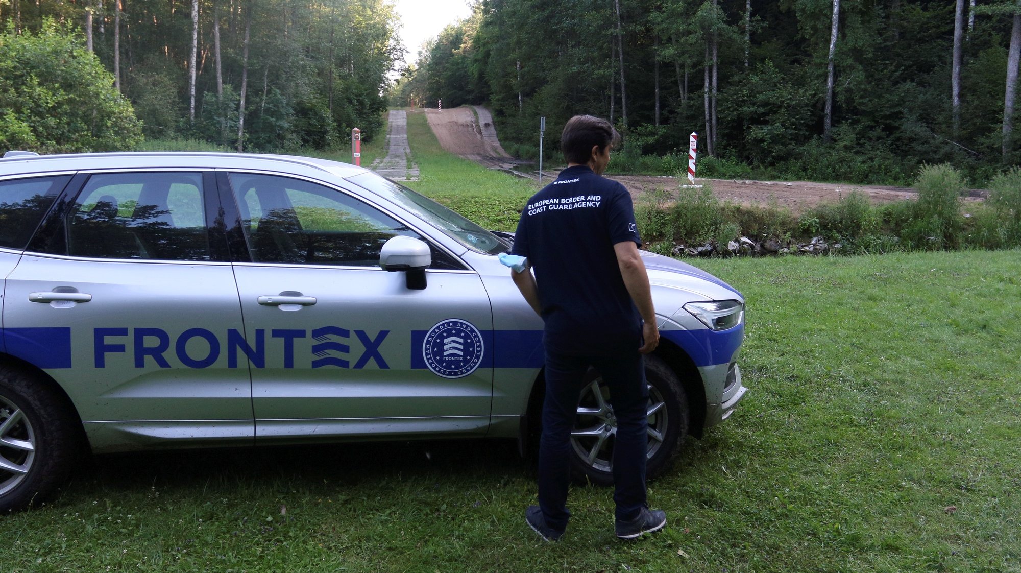 epa09353882 A member of the European Union border agency Frontex  in Kapciamiestis BCU, Lithuania, 19 July 2021. The European Union border agency Frontex is deploying 60 border guards to control the flows of illegal migrants from Belarus crossing the Lithuanian border. Over 1,900 migrants have been detained in Lithuania so far this year. Most of the migrants are from Iraq who have flown to Belarus on direct flights from Baghdad and Istanbul.  EPA/STR