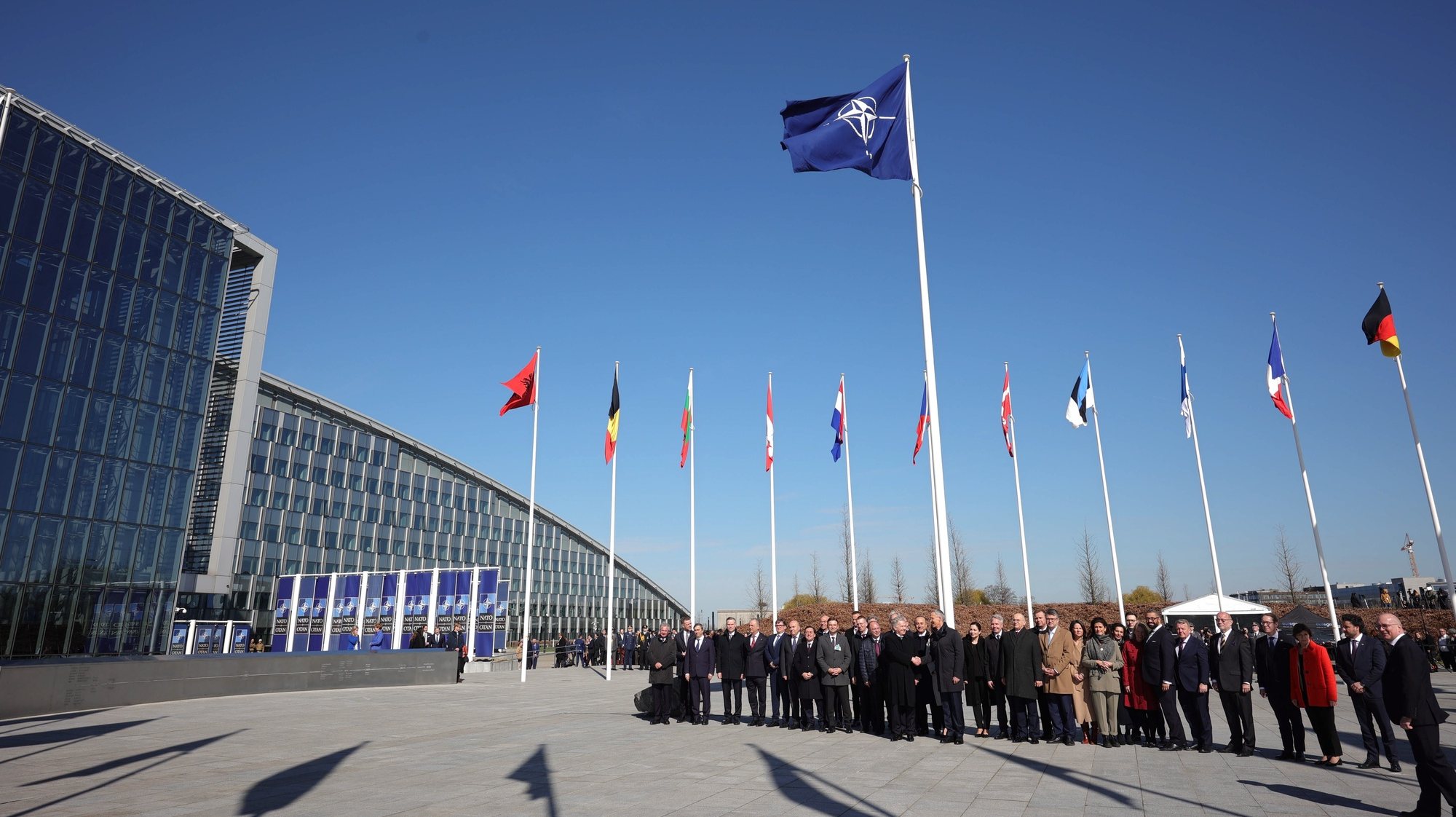 epa10558259 Officials attend a flag-raising ceremony for Finland&#039;s accession during NATO foreign ministers&#039; meeting at the Alliance&#039;s headquarters in Brussels, Belgium, 04 April 2023. Finland becomes the 31st member of the Alliance on 04 April.  EPA/OLIVIER MATTHYS / POOL