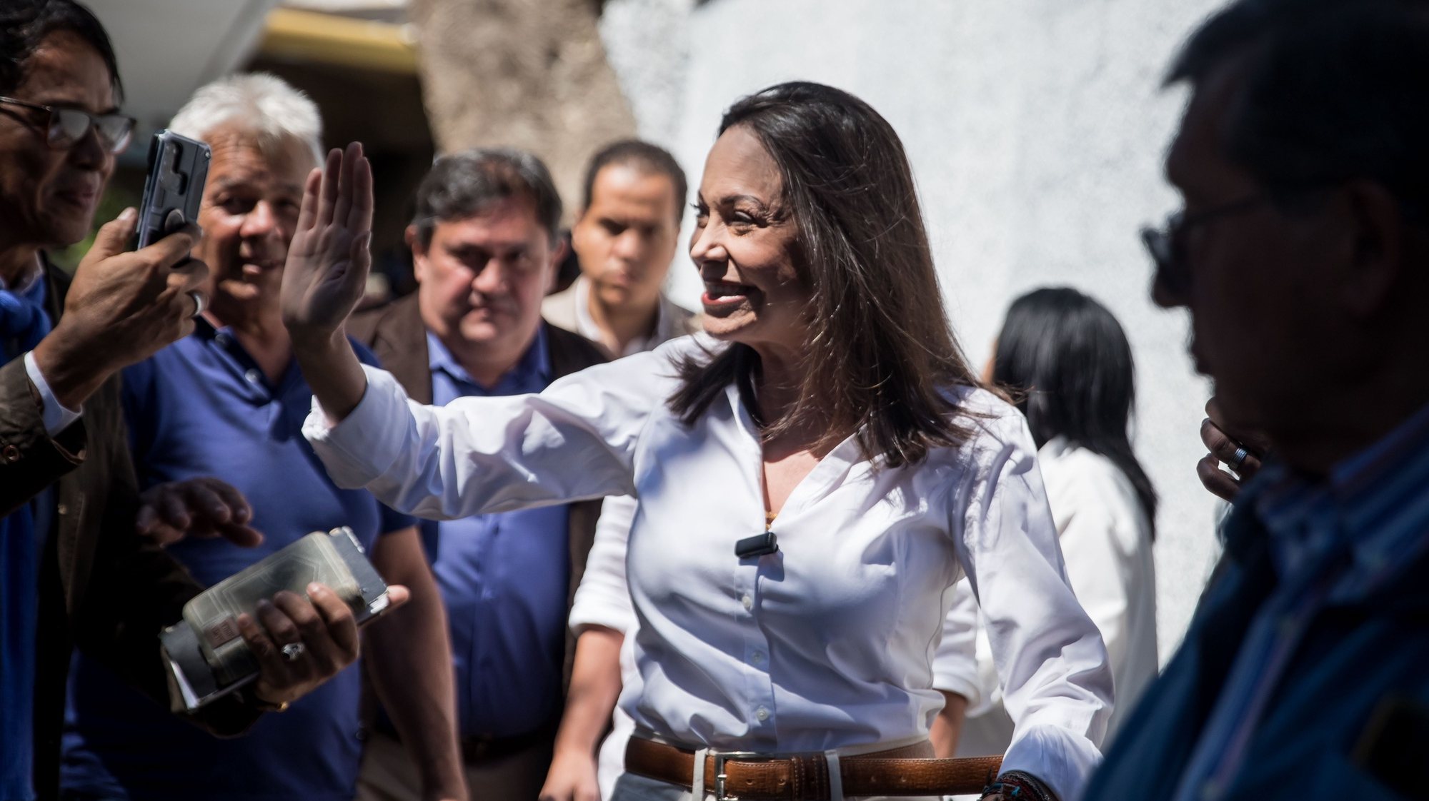 epaselect epa11112841 Venezuelan opposition leader Maria Corina Machado greets her followers during a rally in Caracas, Venezuela, 29 January 2024. Machado assured on 29 janaury that she will run in this year&#039;s presidential elections, as candidate of the largest anti-Chavez bloc, despite the ruling of the Supreme Court of Justice (TSJ) issued on published on 26 Janaury stating that she is disqualified to participate in elections until 2036.  EPA/MIGUEL GUTIERREZ