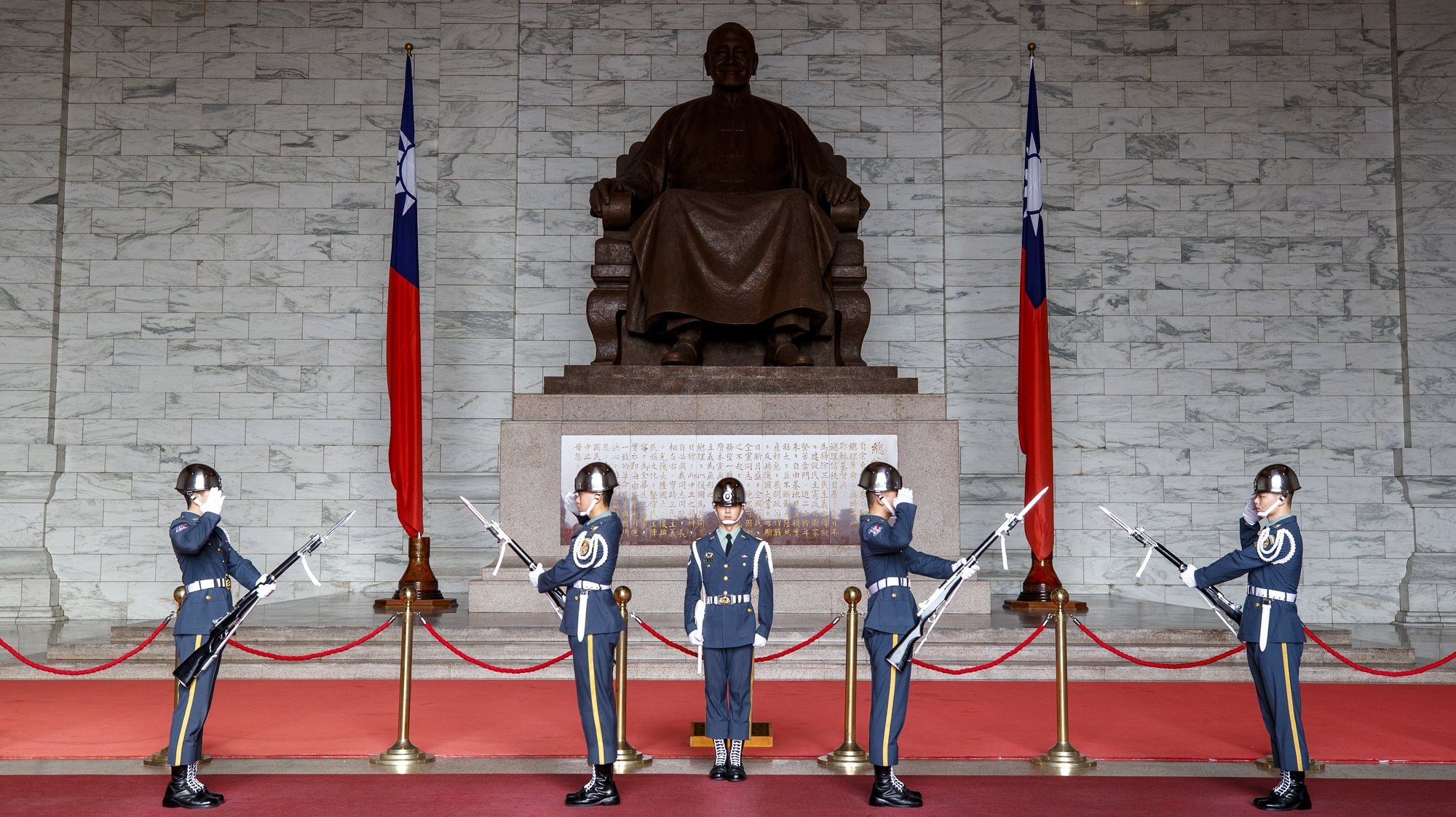 epa10688018 Taiwanese honor guards march inside the Chiang Kai-shek Memorial Hall in Taipei, Taiwan, 13 June 2023. China started military maneuvers on 13 June in the East China Sea to the north of Taiwan, including live-fire drills from warships, as the US and its allies continued their exercises in the Western Pacific. China&#039;s Maritime Safety Administration issued a no-sail zone warning for the region off Taizhou city in Zhejiang province during the live fire drills.  EPA/RITCHIE B. TONGO