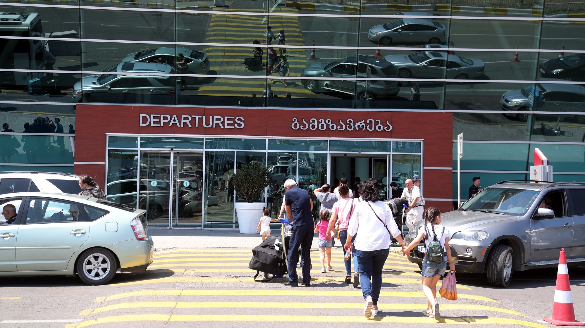 epa07672389 Travellers at Shota Rustaveli International Airport in Tbilisi, Georgia 25 June 2019. Russian President Vladimir Putin has signed a decree ban on Russian airlines flights to Georgia which will go into effect on 08 July 2019. The decree was signed after the riots in Tbilisi, as a reaction to a Russian State Duma deputy&#039;s presence in the Georgian parliament, who headed the Interparliamentary Assembly on Orthodoxy held in Georgia.  EPA/ZURAB KURTSIKIDZE