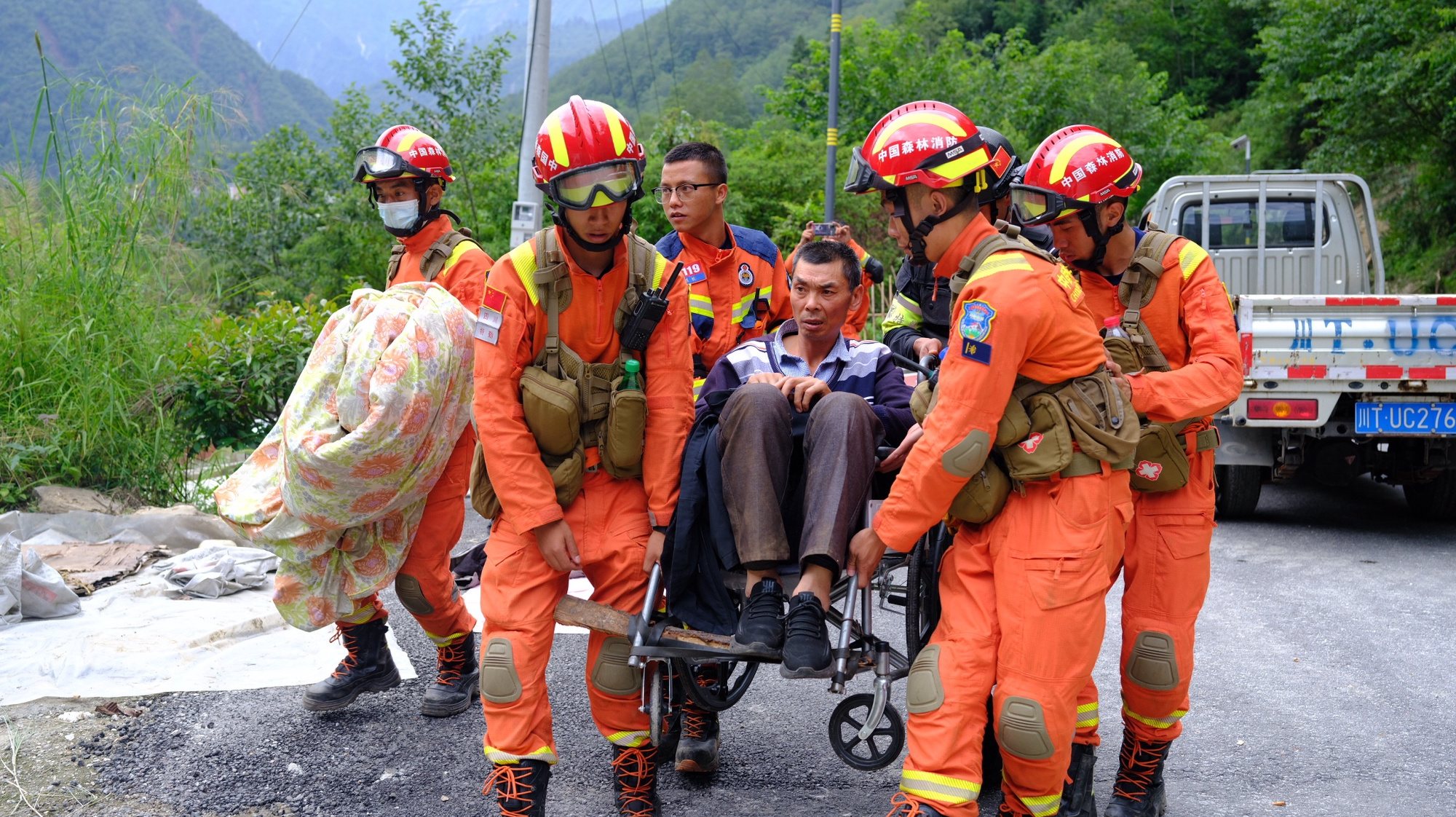 epa10163825 Rescuers evacuate injured people after the earthquake in Luding county, Ganzi prefecture, Sichuan Province, China, 06 September 2022. A 6.8 magnitude earthquake hit China’s southwest Sichuan province on 05 September. According to state media, the death toll has risen to at least 65 people, with more than 10 people missing and 200 injured. The strongest earthquake in the region since 2017 triggered landslides and shook the provincial capital Chengdu, whose 21 million residents are already under a COVID-19 lockdown. Chinese rescue teams saved 15 people while still trying to evacuate 1000 villagers from the epicenter in Luding that got isolated by the landslide.  EPA/STRINGER CHINA OUT