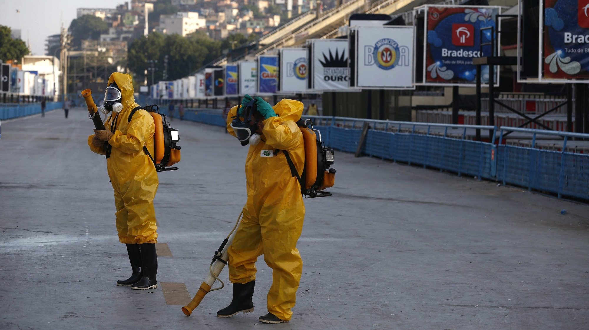 epa05127225 Local workers disinfect the famous Sambadrome in Rio de Janeiro, Brazil, 26 January 2016, ahead of the beginning of Rio&#039;s Carnival parades, on next 05 February, to fight against the mosquito Aedes aegypti, which spreads the Zika, Dengue and Chikunguna viruses. The carnival stadium Sambadrome will host the archery events during the Summer Olympic Games Rio 2016.  EPA/MARECELO SAYAO
