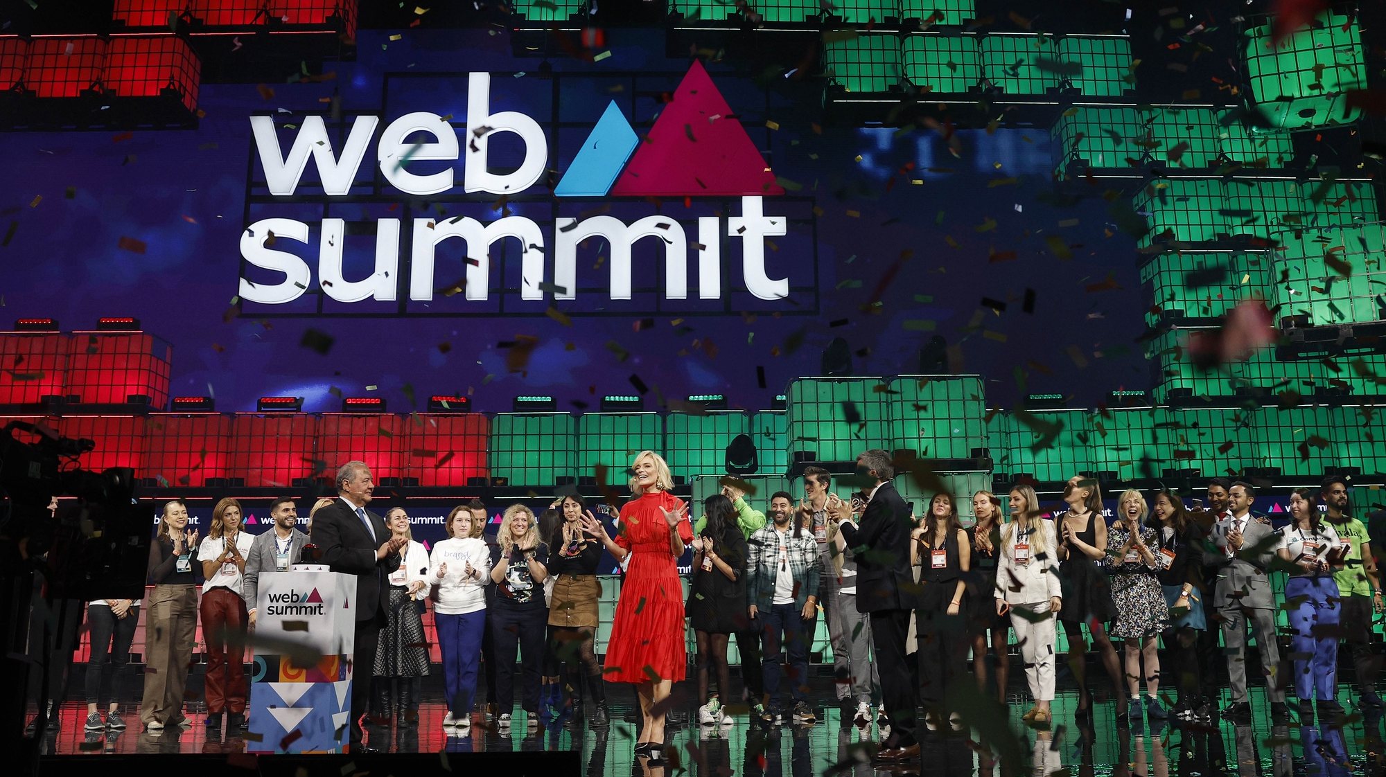 Web Summit CEO Katherine Maher (C), flanked by Lisbon Mayor, Carlos Moedas (R), and the Portuguese Economy and Sea minister, Antonio Costa Silva (L), during the opening ceremony of the 2023 Web Summit in Lisbon, Portugal, 13 November 2023. The Web Summit is considered the largest event of startups and technological entrepreneurship in the world and takes place from 13 to 16 of November in Lisbon. ANTÓNIO PEDRO SANTOS/LUSA