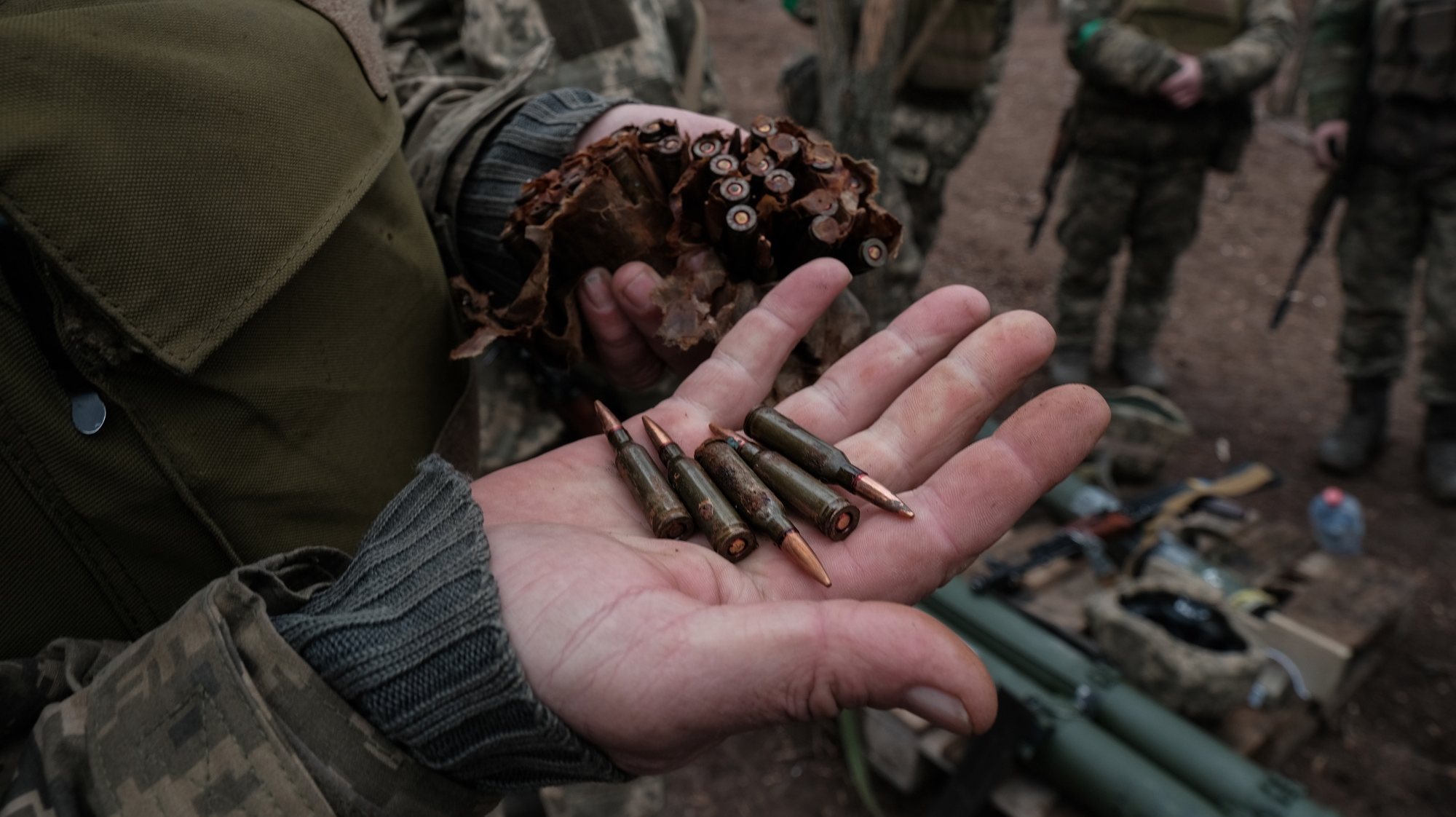 epa11222862 An Ukrainian soldier shows ammunition as new recruits receive training at an undisclosed location in the Donetsk region to complete their formation as infantrymen of Ukraine&#039;s 22nd Army Brigade, Donetsk, Ukraine 15 March 2024. The training lasts several months and recruits are instructed in combat medicine, handling of small arms, RPGs and BMP-1 type armoured vehicles, among other training. The Ukrainian Army is currently seeking to enlist 350,000 new soldiers to replace those who have been fighting for more than two years after Russian troops entered Ukrainian territory in February 2022, starting a conflict that has provoked destruction and a humanitarian crisis.  EPA/Maria Senovilla
