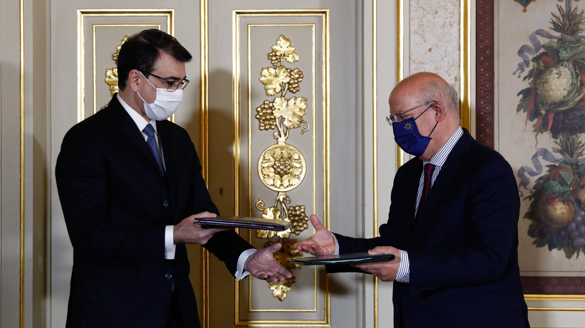 Portuguese Minister of State for Foreign Affairs Augusto Santos Silva (R) and his Brazilian counterpart Carlos Franco Franca (L) after signing agreements during their meeting at the Necessidades Palace in Lisbon, Portugal, 02 July 2021.  ANTONIO COTRIM/LUSA