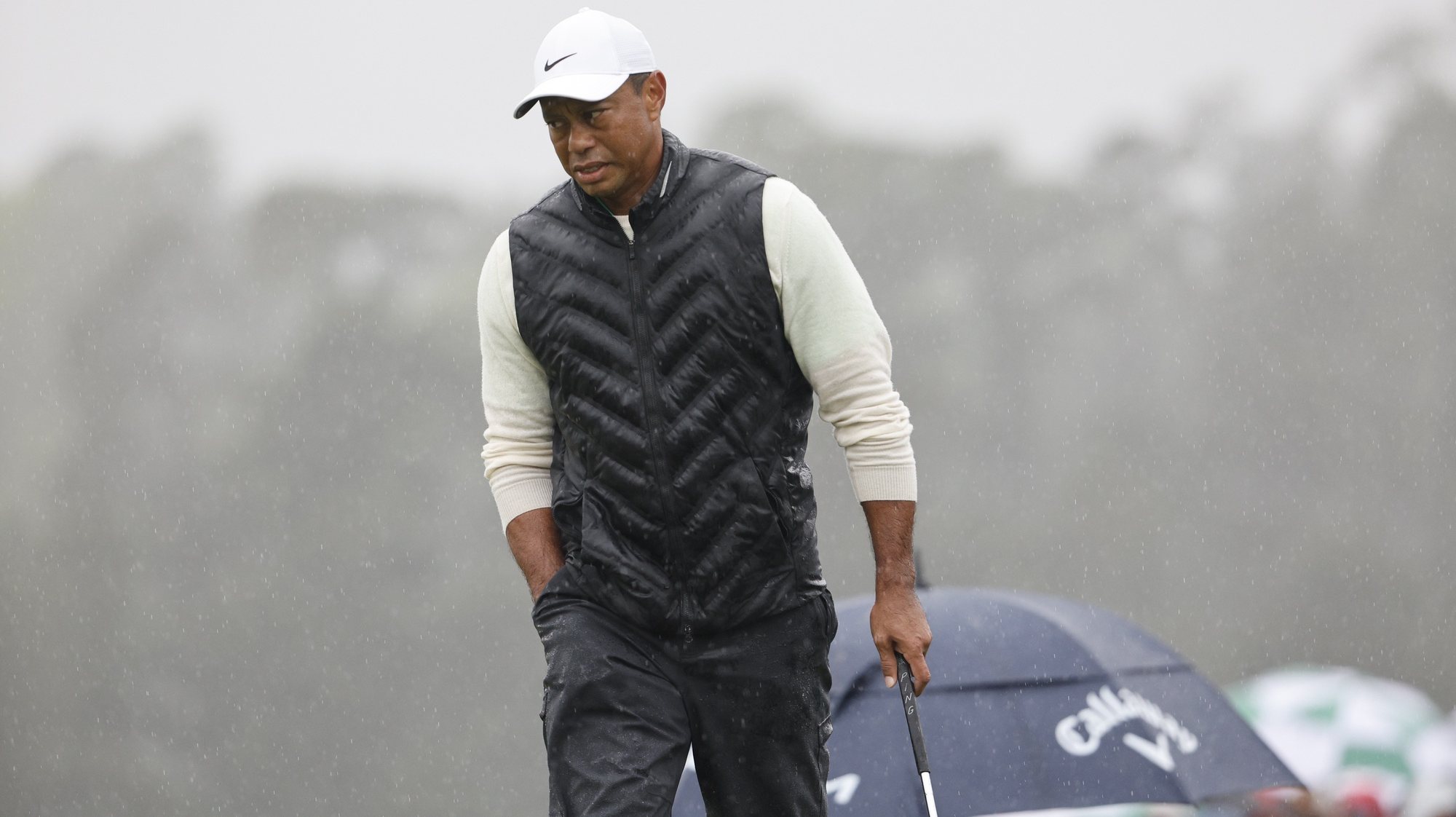epa10564743 Tiger Woods of The United States on the 18th green in the second round of the Masters Tournament at the Augusta National Golf Club in Augusta, Georgia, USA, 08 April 2023. Play was suspended due to weather and resumed 08 April 2023.  EPA/ERIK S. LESSER