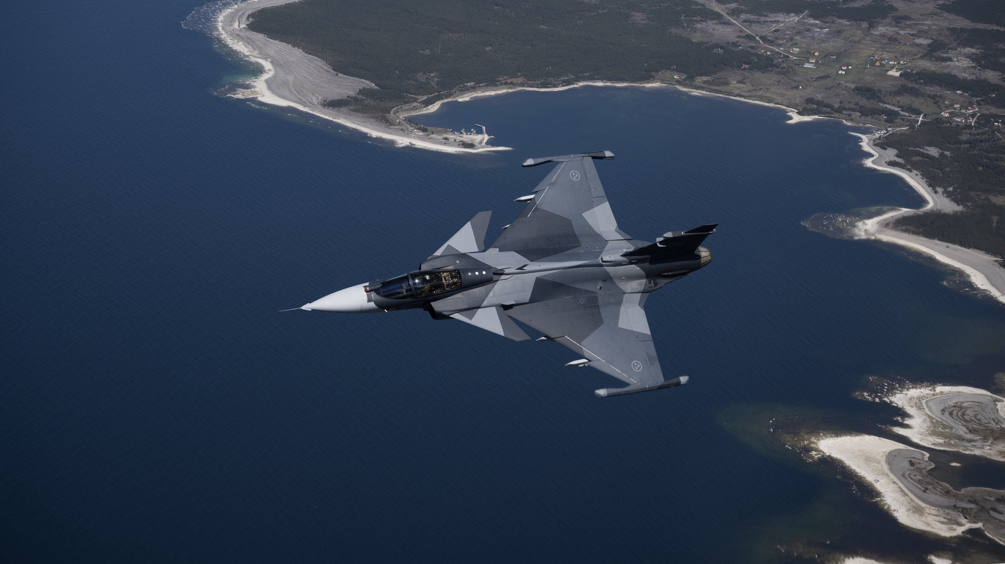 epa09951498 Sweden&#039;s jet fighter Jas 39 Gripen E flying over the island Gotland in the baltic sea, Sweden, 11 May 2022 (Issued on 16 May 2022). Sweden&#039;s government has decided to apply for a NATO membership. The leaders of Sweden and Finland have confirmed they will apply for NATO membership as a result of Russia&#039;s invasion of Ukraine. The move would bring the expansion of the Western military alliance to 32 member countries.  EPA/HENRIK MONTGOMERY  SWEDEN OUT