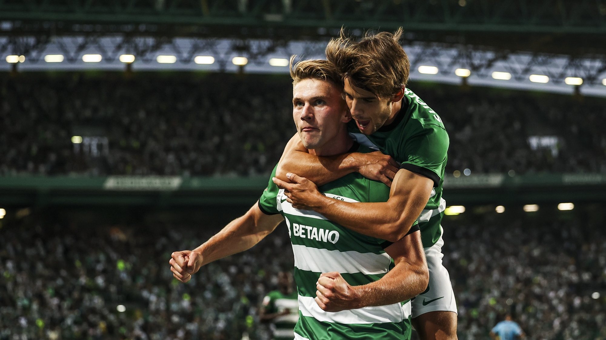 Sporting CP player Vyktor Gyokeres (L) celebrates with team mate Daniel Braganca after scoring a goal against Vizela during the First League Soccer match held at Alvalade Stadium, in Lisbon, Portugal, 12 August 2023. JOSE SENA GOULAO/LUSA