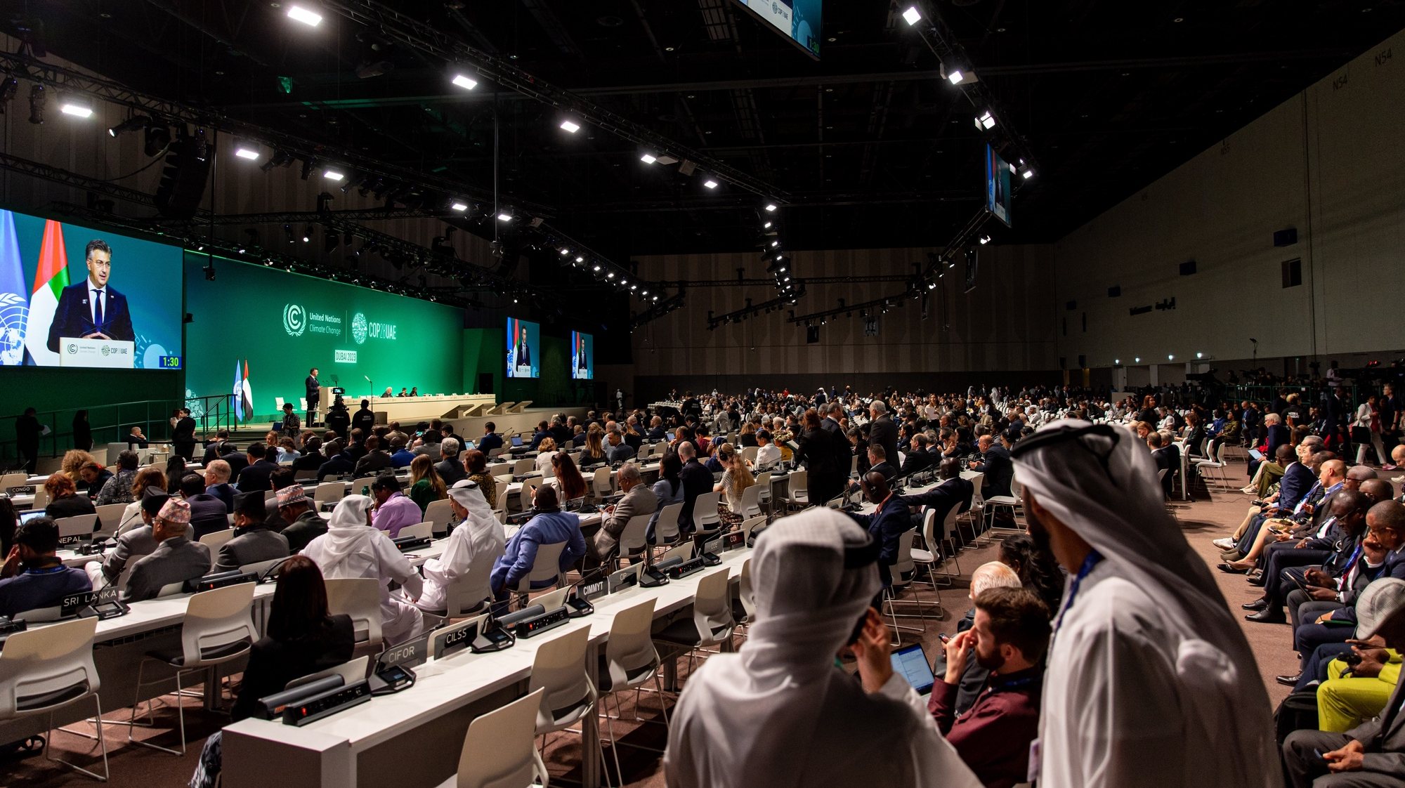 epa11006761 Participants attend the UN Climate Change Conference COP28, in Dubai, United Arab Emirates, 02 December 2023. The 2023 United Nations Climate Change Conference (COP28), runs from 30 November to 12 December, and is expected to host one of the largest number of participants in the annual global climate conference as over 70,000 estimated attendees, including the member states of the UN Framework Convention on Climate Change (UNFCCC), business leaders, young people, climate scientists, Indigenous Peoples and other relevant stakeholders will attend.  EPA/MARTIN DIVISEK