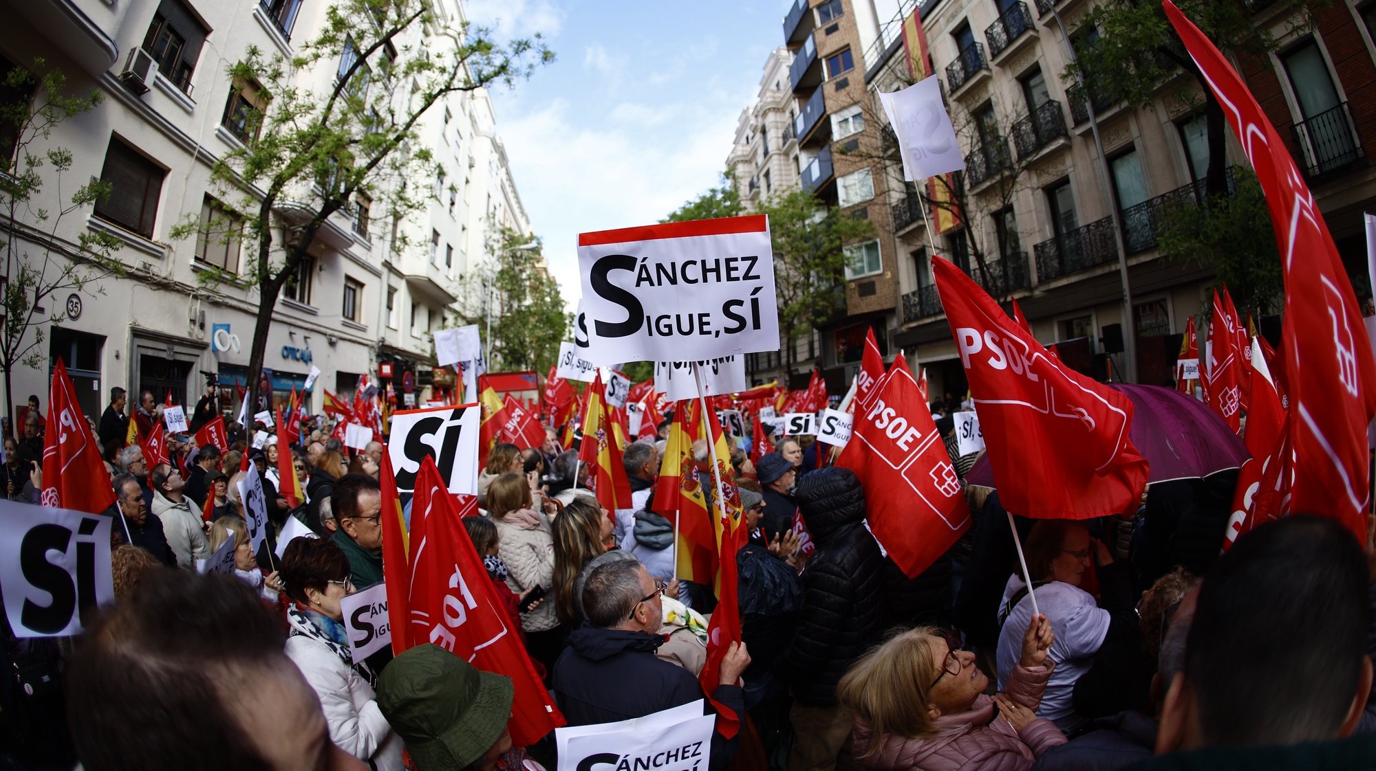 epa11304281 A demonstrators holds a banner reads &#039;Sanchez Gets On, Yes&#039; as Spanish Socialist Party&#039;s supporters are gathered outside the party&#039;s headquarters in support of the Spanish prime minister, during a party&#039;s Federal Commitee meeting in Madrid, Spain, 27 April 2024. Spanish Prime Minister Pedro Sanchez published on 24 April 2024 on &#039;X&#039; social media a letter to the citizens in which he explains he would be taking some days off to think about resignation after it was announced that his wife, Begona Gomez, was to be investigated after right wing union &#039;Manos Limpias&#039; filed a complaint against her. Sanchez blames a political &#039;harassment and bullying operation by land, air and sea&#039; to cause his &#039;personal and political collapse&#039; by attacking his wife. In the letter he announces he will communicate his decision next 29 April 2024.  EPA/Rodrigo Jimenez