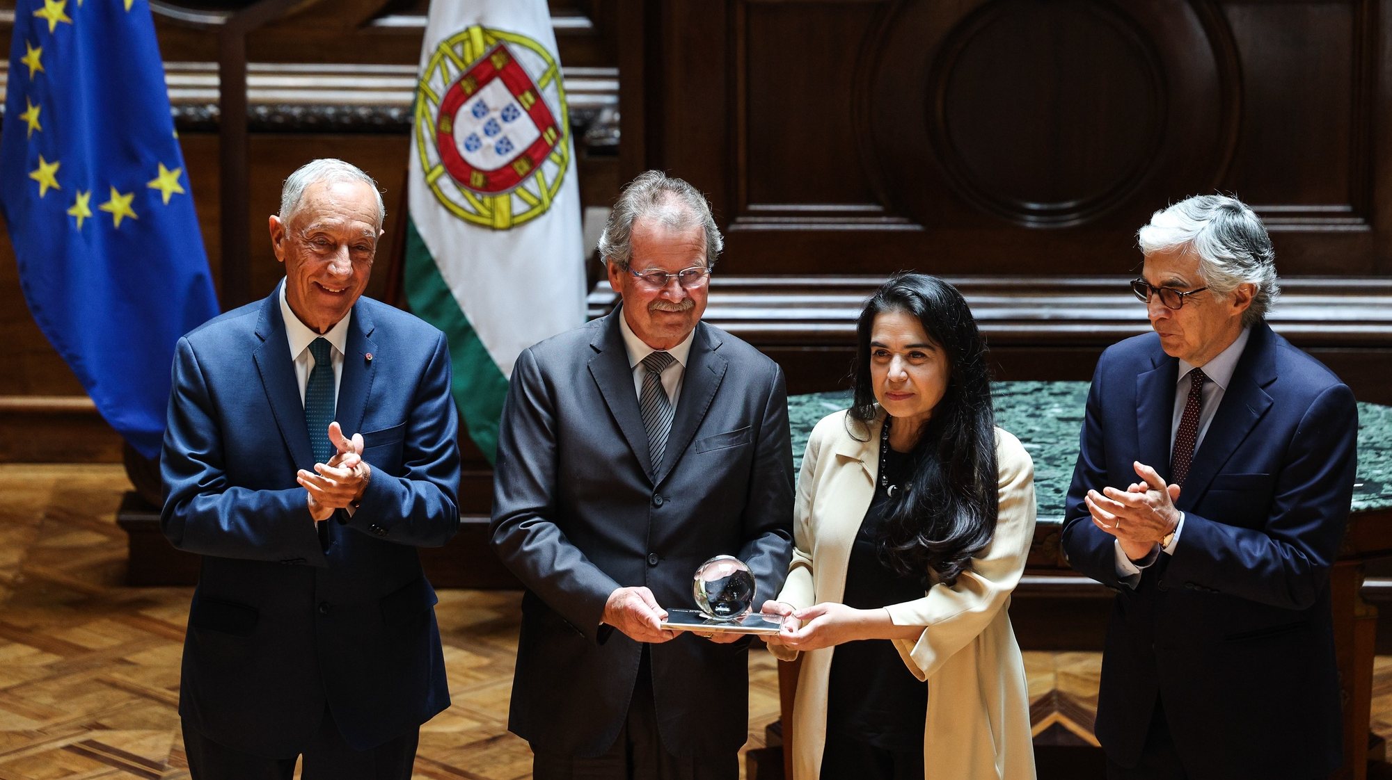 Portuguese President Marcelo Rebelo de Sousa (L) and the President of the Assembly Jose Pedro Aguiar Branco (R) applaud the awarding of Global Campus of Human Rights President Veronica Gomez (2-R) and General-Secretary Manfred Nowak (2-L) with the North/South prize during the ceremony held at the Portuguese Parliament in Lisbon, Portugal, 21 May 2024. The Council of Europe&#039;s North-South Prize annually distinguishes two personalities or organizations for their commitment to Human Rights, Democracy, and Rule of Law, and for their contribution to North-South dialogue and encouragement of solidarity, interdependence, and partnerships. TIAGO PETINGA/LUSA