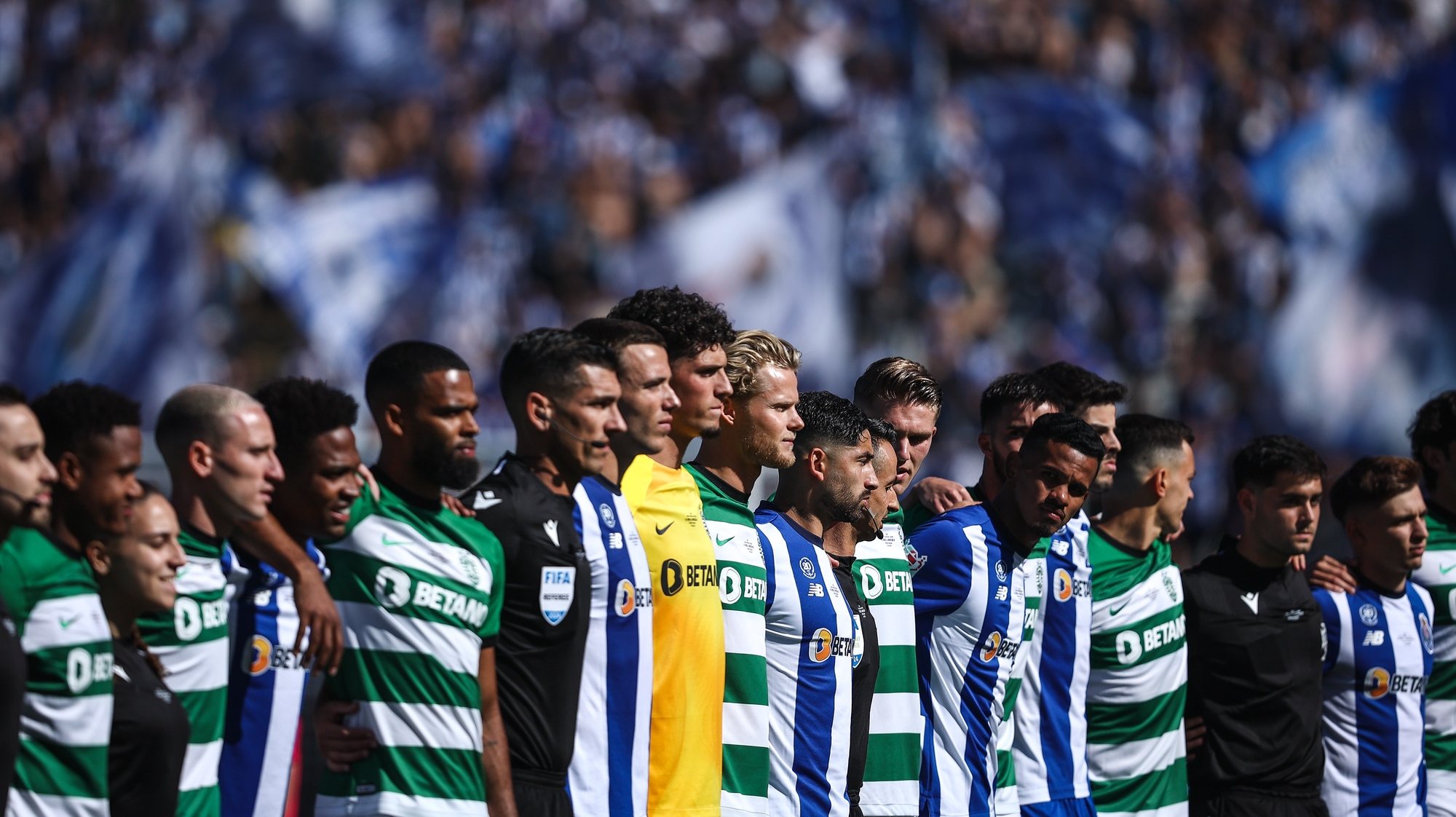 FC Porto and Sporting CP players stand before the Portuguese Soccer Cup final match between FC Porto and Sporting CP at Jamor Nacional stadium in Oeiras, outskirts Lisbon, Portugal, 26 May 2024. RODRIGO ANTUNES/LUSA