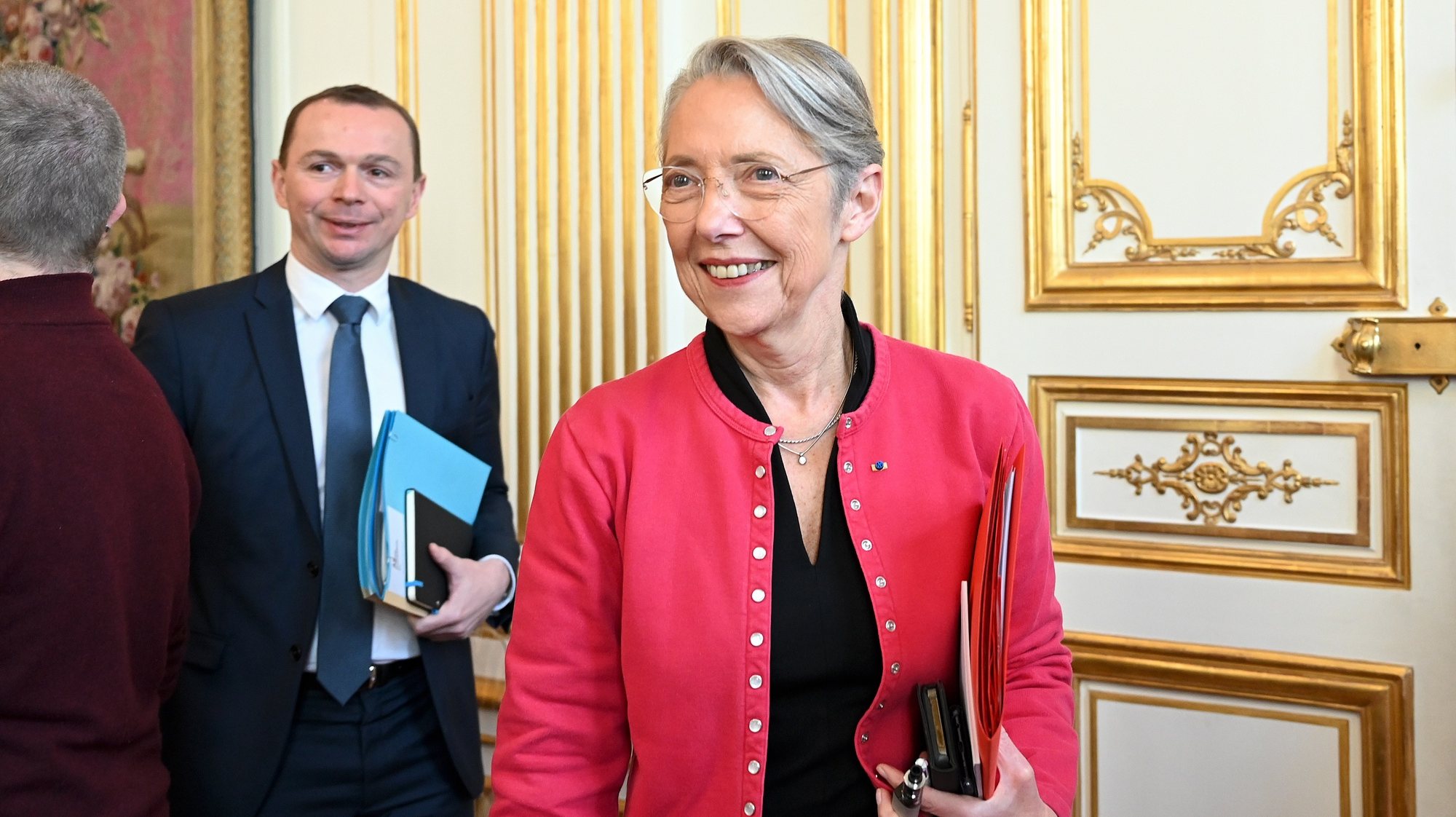 epa10559375 France&#039;s Prime minister Elisabeth Borne (R) and France&#039;s Labour Minister Olivier Dussopt arrive for talks with inter-unions representatives at the Hotel de Matignon in Paris, France, 05 April 2023, after a pensions reform was pushed through parliament by the French government without a vote, using the article 49.3 of the constitution.  EPA/BERTRAND GUAY / POOL  MAXPPP OUT