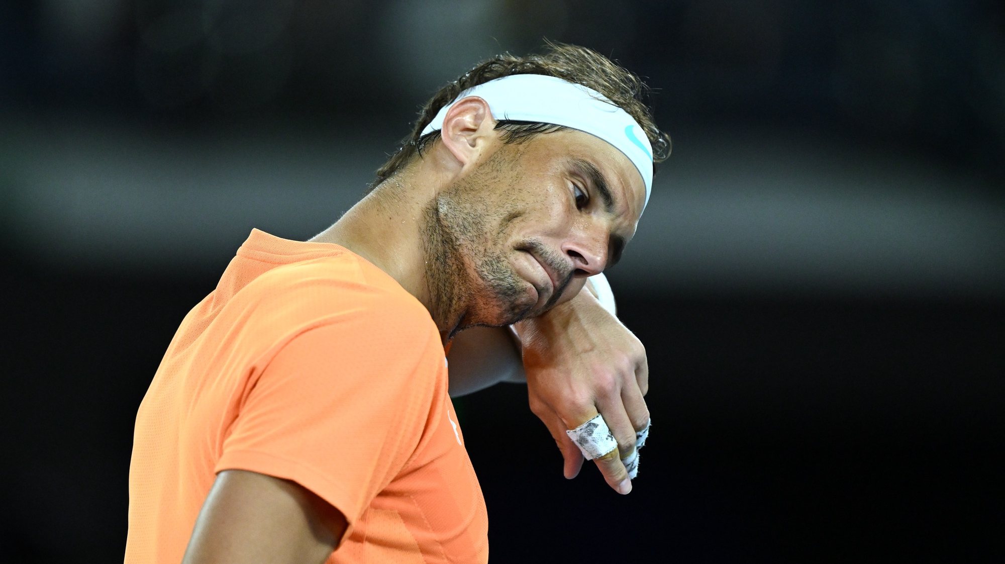 epa10412508 Rafael Nadal of Spain react during his match against Mackenzie McDonald of the USA  of the USA of the 2023 Australian Open tennis tournament at Melbourne Park in Melbourne, Australia, 18 January 2023.  EPA/LUKAS COCH AUSTRALIA AND NEW ZEALAND OUT