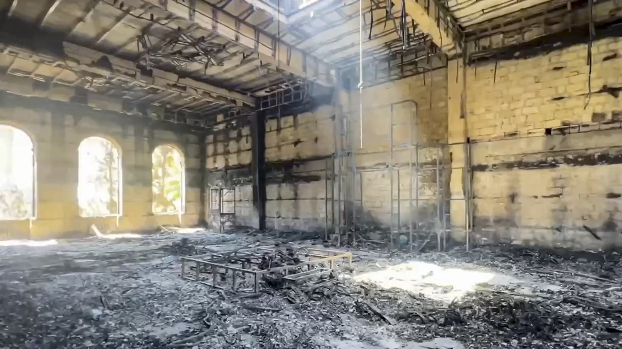 epa11433920 A handout still image taken from handout video made available on the Telegram Channel of the head of Dagestan Republic Sergey  Melikov shows damaged Kele-Numaz synagogue following a terror attack in Derbent, Republic of Dagestan, Russia, 24 June 2024. At least 15 Police officers and several other civilians were killed in attacks on two Orthodox churches, two synagogues and a traffic police station on 23 June, the head of Dagestan Sergey Melikov reported. The Dagestan National Anti-Terrorism Committee (NAC) has reported that five attackers were killed. The Committee is currently engaged in operational efforts to apprehend the remaining attackers and their aides.  EPA/TELEGRAM CHANNEL OF THE HEAD OF DAGESTAN REOUBLIC / HANDOUT BEST QUALITY AVAILABLE HANDOUT EDITORIAL USE ONLY/NO SALES HANDOUT EDITORIAL USE ONLY/NO SALES