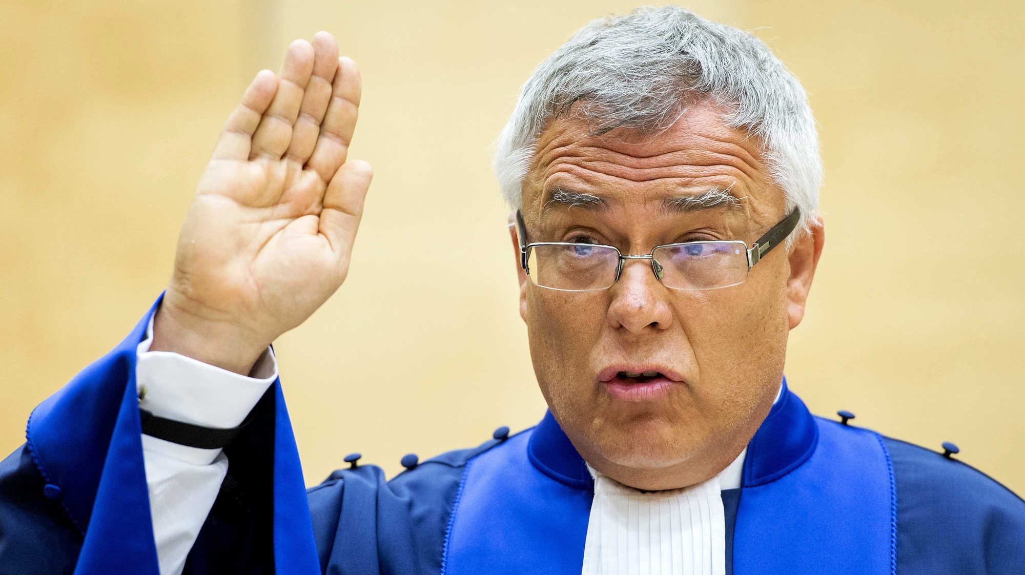 epa04656355 Judge Piotr Hofmanski of Poland takes the oath during a swearing-in ceremony for six new judges at the International Criminal Court (ICC) in The Hague, the Netherlands, 10 March 2015.  EPA/KOEN VAN WEEL / POOL