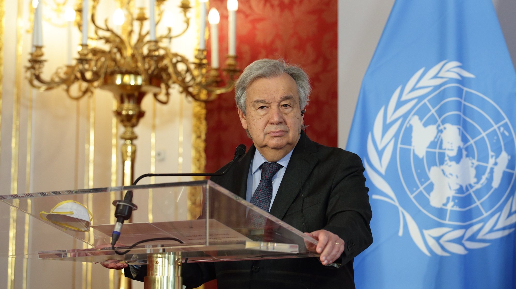 epa09939668 UN Secretary-General Antonio Guterres listens during a news conference after his meeting with Austrian President Alexander Van der Bellen (not pictured) at the Presidential office in Vienna, Austria, 11 May 2022. Guterres is on a three day trip in Vienna to join the UN System Chief Executives Board for Coordination (CEB).  EPA/HEINZ-PETER BADER