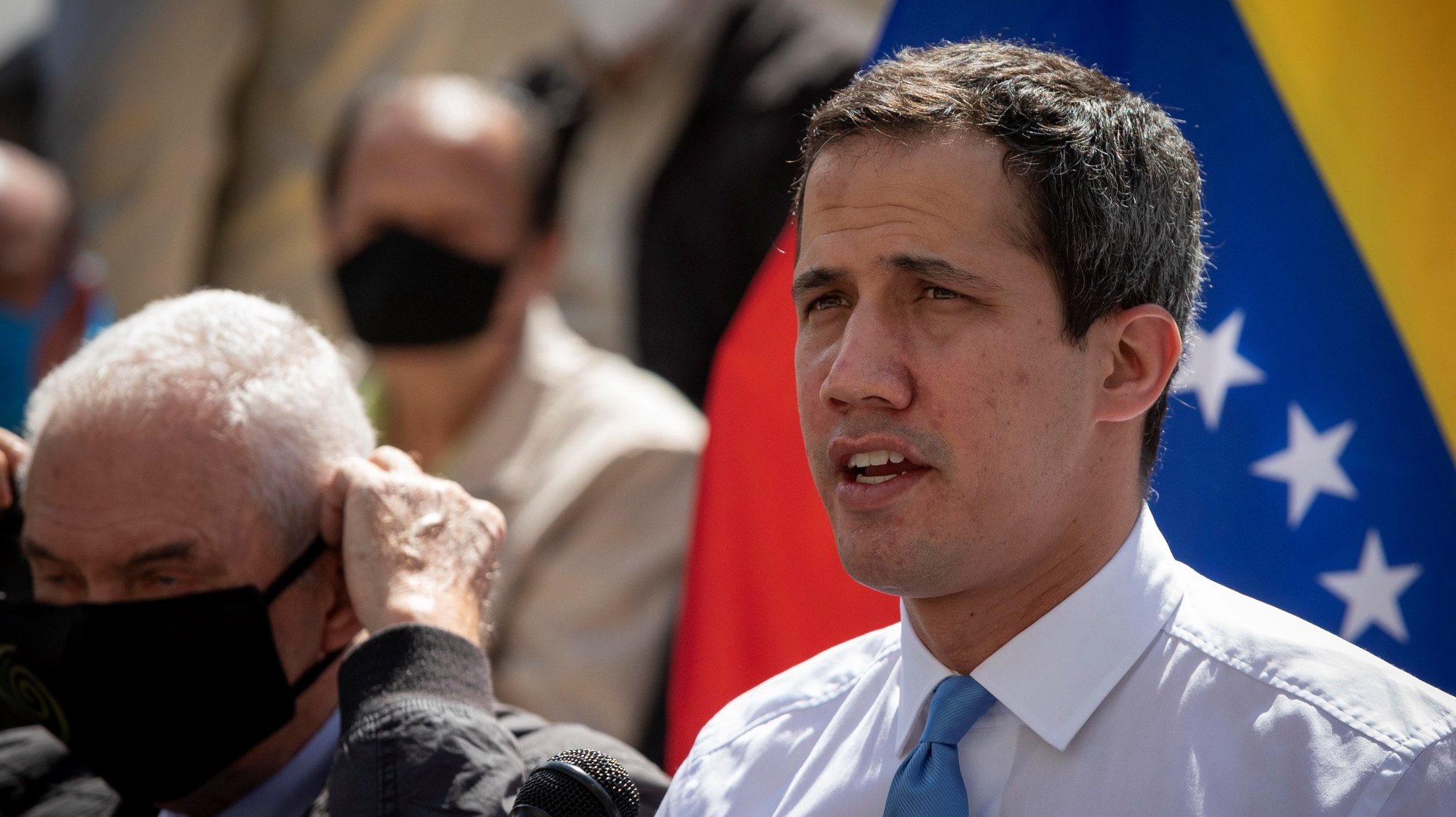 epa08985494 Venezuelan opposition leader Juan Guaido speaks during a press conference in Caracas, Venezuela, 03 February 2021. Guaido said that he is willing to seek resources for Venezuela to enter the COVAX vaccination program against covid-19, but indicated that its implementation depends on the Government of Nicolas Maduro accepting the scheme of the Pan American Health Organization (PAHO). On 20 January 2021, the lawyers of the board of the Central Bank of Venezuela (BCV) appointed by Maduro denounced that Guaido&#039;s team prevented access to funds in London that would allow participation in the Covax Mechanism.  EPA/RAYNER PENA R