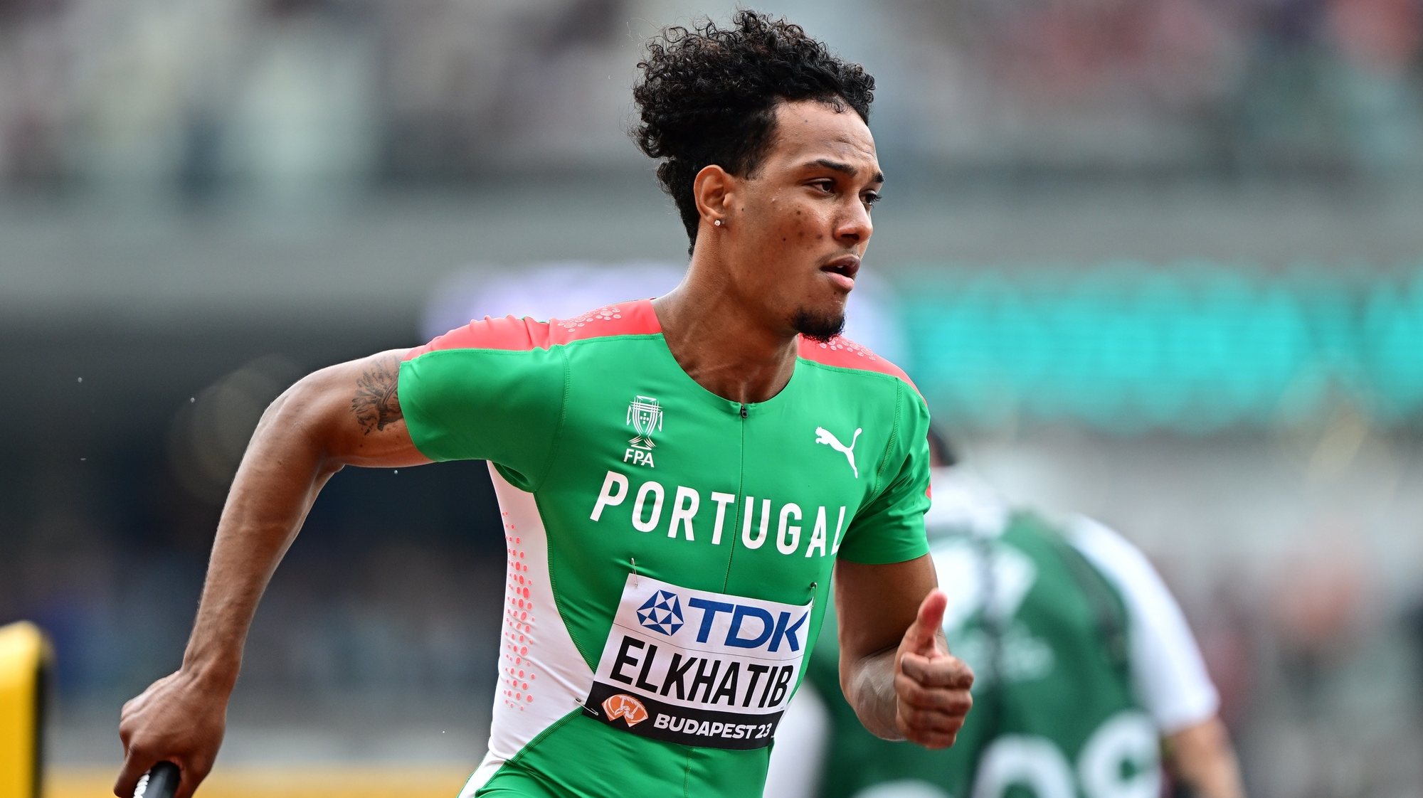 epa10806852 Omar Elkahatib of Portugal in action during the 4x400 Metres Relay Mixed Heat 1 competition of the World Athletics Championships in Budapest, Hungary, 19 August 2023.  EPA/CHRISTIAN BRUNA