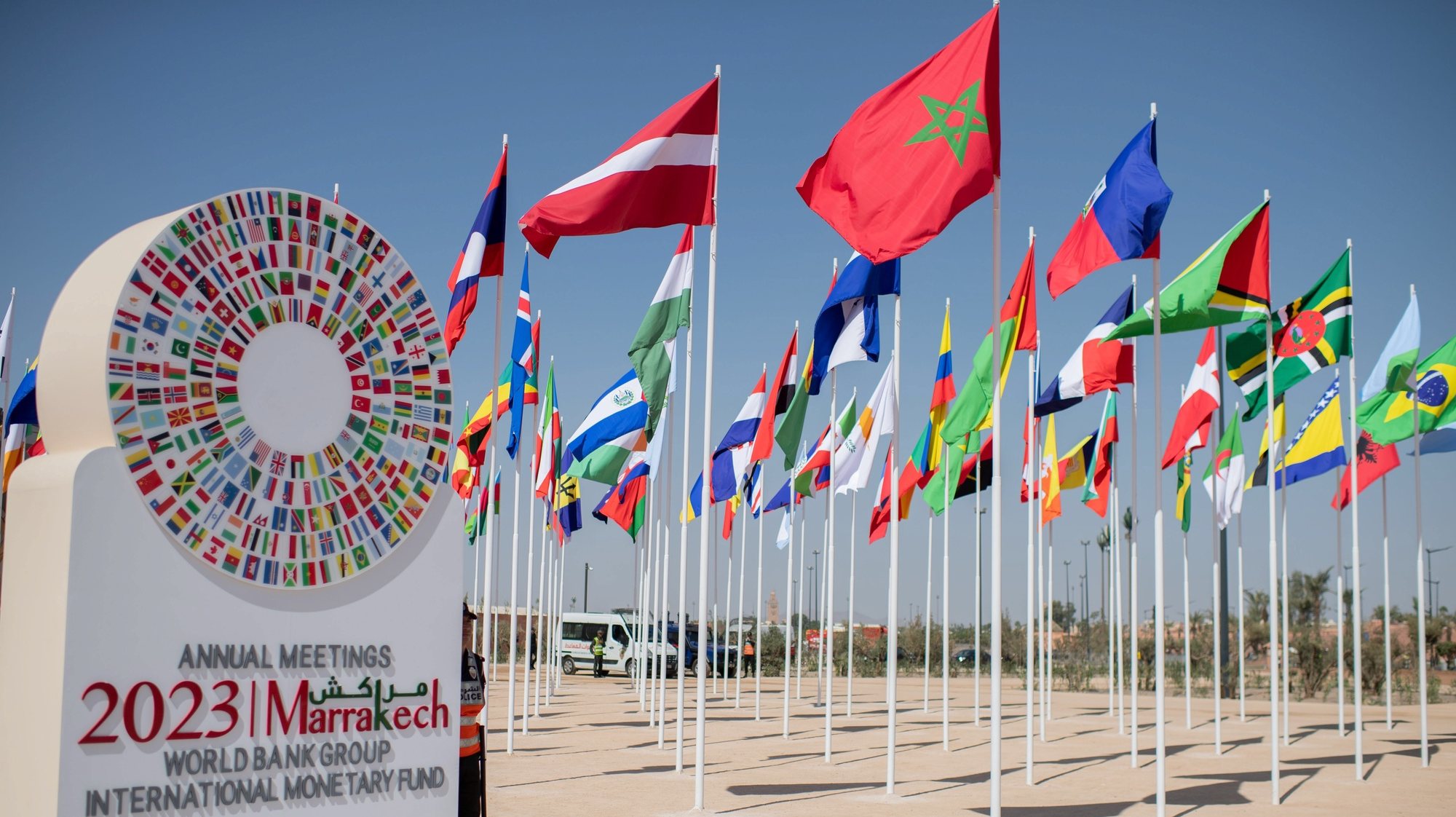 epa10907917 Flags flutter at the entrance of the venue hosting the 2023 Annual Meetings of the International Monetary Fund and World Bank in Marrakesh, Morocco, 08 October 2023. The meetings are taking place in Marrakech between 09 and 15 October.  EPA/JALAL MORCHIDI