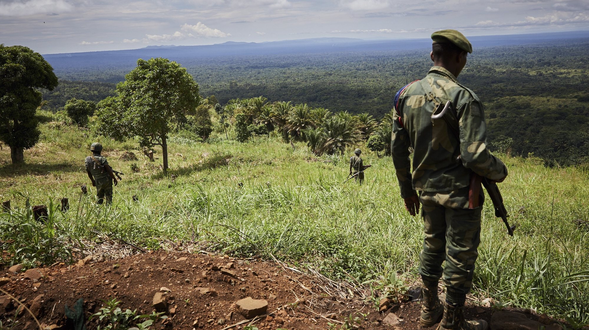 epa07567840 Soldiers of the Congolese national army, the Armed Forces of the Democratic Republic of the Congo (FARDC), take a position that overlooks the so-called &#039;triangle of death&#039; where the ADF militia group operate, in Beni, North Kivu province, Democratic Republic of the Congo, 11 May 2019 (issued 13 May 2019). Dealing with the Ebola outbreak in Beni has multiple security challenges including attacks from local Mai Mai militia group and the Ugandan-originating Allied Democratic Forces (ADF) rebel group that claimed to be connected to the Islamic State (IS) networks.  EPA/HUGH KINSELLA CUNNINGHAM