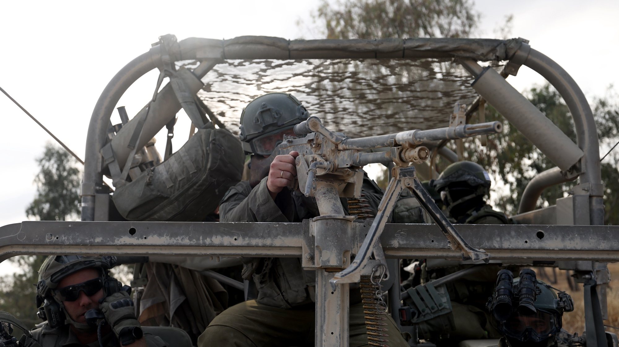 epa11312772 Israeli soldiers prepare to enter the Gaza Strip at a gathering site near the border, Israel, 01 May 2024. More than 34,300 Palestinians and over 1,455 Israelis have been killed, according to the Palestinian Health Ministry and the Israel Defense Forces (IDF), since Hamas militants launched an attack against Israel from the Gaza Strip on 07 October 2023, and the Israeli operations in Gaza and the West Bank which followed it.  EPA/ATEF SAFADI