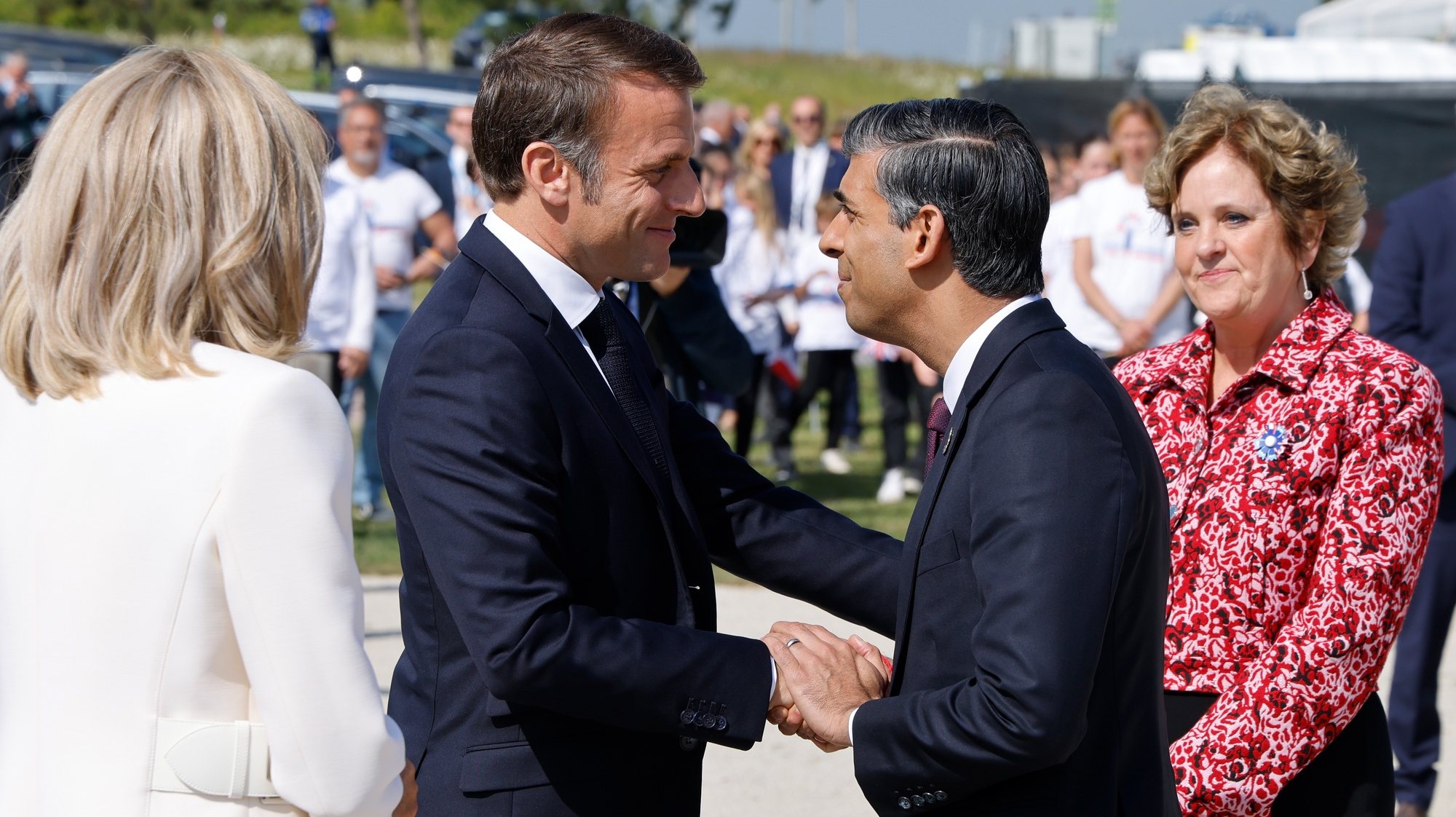 epa11392987 France&#039;s President Emmanuel Macron (L) shakes hands with Britain&#039;s Prime Minister Rishi Sunak during the UK Ministry of Defence and the Royal British Legionâ€™s commemorative ceremony marking the 80th anniversary of the World War II &#039;D-Day&#039; Allied landings in Normandy, at the World War II British Normandy Memorial near the village of Ver-sur-Mer which overlooks Gold Beach in northwestern France, 06 June 2024. The D-Day ceremonies on 06 June this year mark the 80th anniversary since the launch of &#039;Operation Overlord&#039;, a vast military operation by Allied forces in Normandy, which turned the tide of World War II, eventually leading to the liberation of occupied France and the end of the war against Nazi Germany.  EPA/LUDOVIC MARIN / POOL  MAXPPP OUT