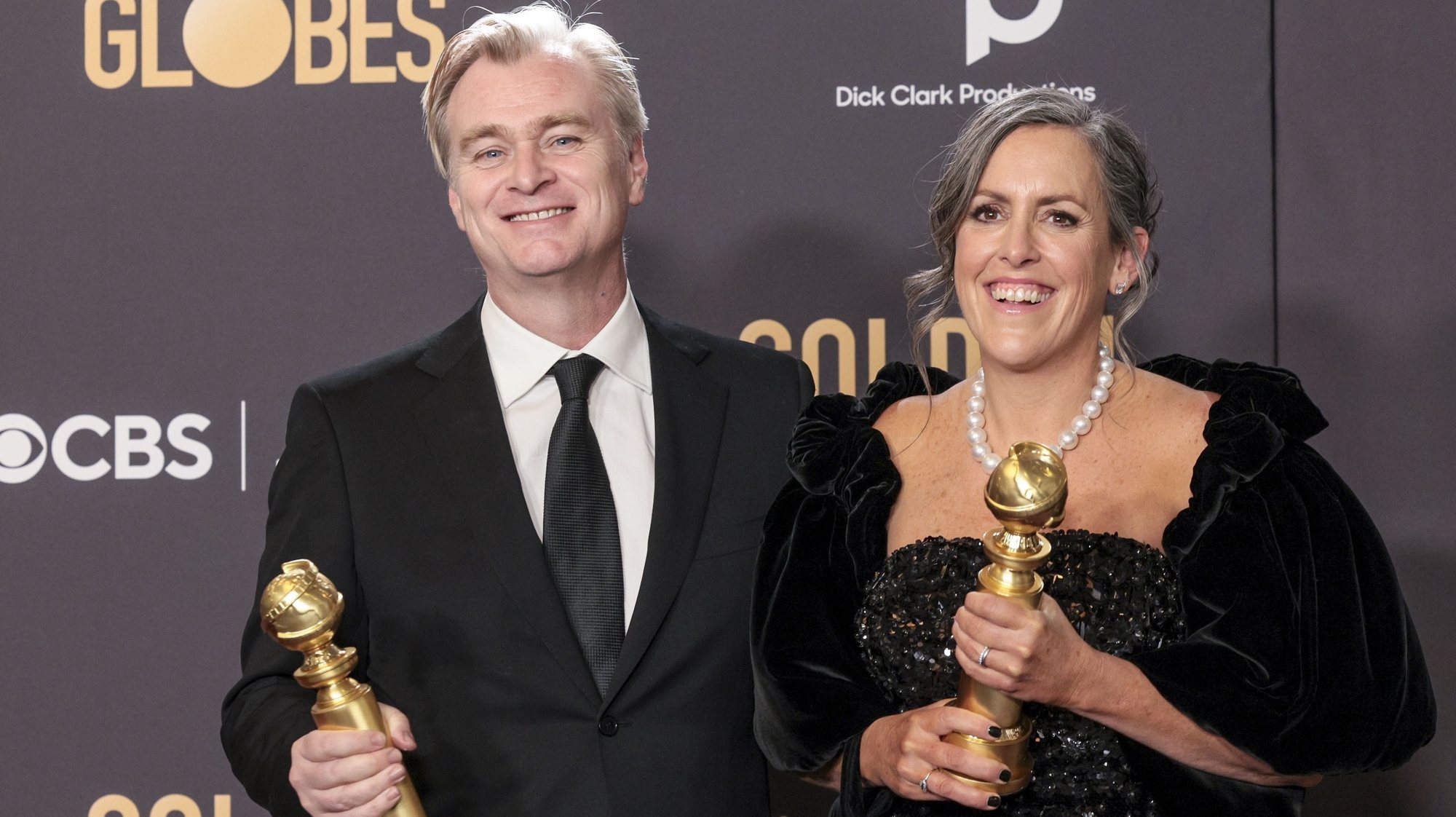 epa11063635 British director Christopher Nolan (L) and British film producer Emma Thomas (R) hold their Golden Globe awards for Best Director - Motion Picture and Best Motion Picture - Drama for &#039;Oppenheimer&#039; in the press room during the 81st annual Golden Globe Awards ceremony at the Beverly Hilton Hotel in Beverly Hills, California, USA, 07 January 2024. Artists in various film and television categories are awarded Golden Globes by the Hollywood Foreign Press Association.  EPA/ALLISON DINNER