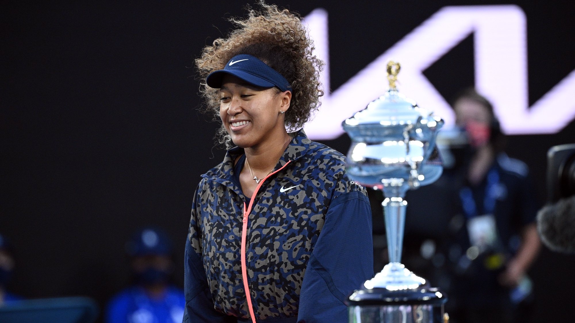 epa09025449 Naomi Osaka of Japan walks past the trophy before the women&#039;s singles final against Jennifer Brady of the United States on day 13 of the Australian Open tennis tournament at Rod Laver Arena in Melbourne, Australia, 20 February 2021.  EPA/DEAN LEWINS  AUSTRALIA AND NEW ZEALAND OUT