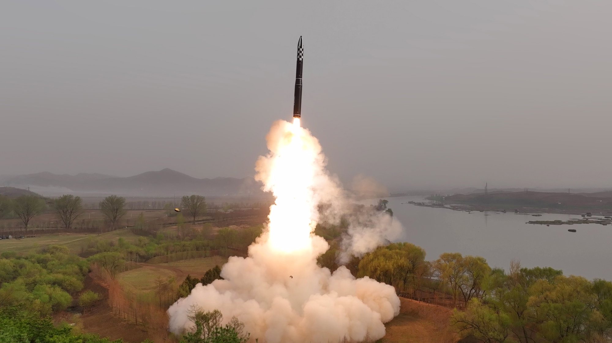 epa10571728 A photo released by the official North Korean Central News Agency (KCNA) shows the test firing of a new solid-fuel Hwasong-18 intercontinental ballistic missile (ICBM) at an undisclosed location in North Korea, 13 April 2023 (Issued 14 April 2023). According to KCNA, a new-type of ICBM Hwasongpho-18 that will serve as an &#039;important war deterrent&#039;, was test-fired on 13 April where the first stage safely landed in the waters 10 kilometres off the Hodo Peninsula in Kumya County, South Hamgyong Province and the second stage in the waters 335 kilometres east of Orang County, North Hamgyong Province.  EPA/KCNA   EDITORIAL USE ONLY  EDITORIAL USE ONLY