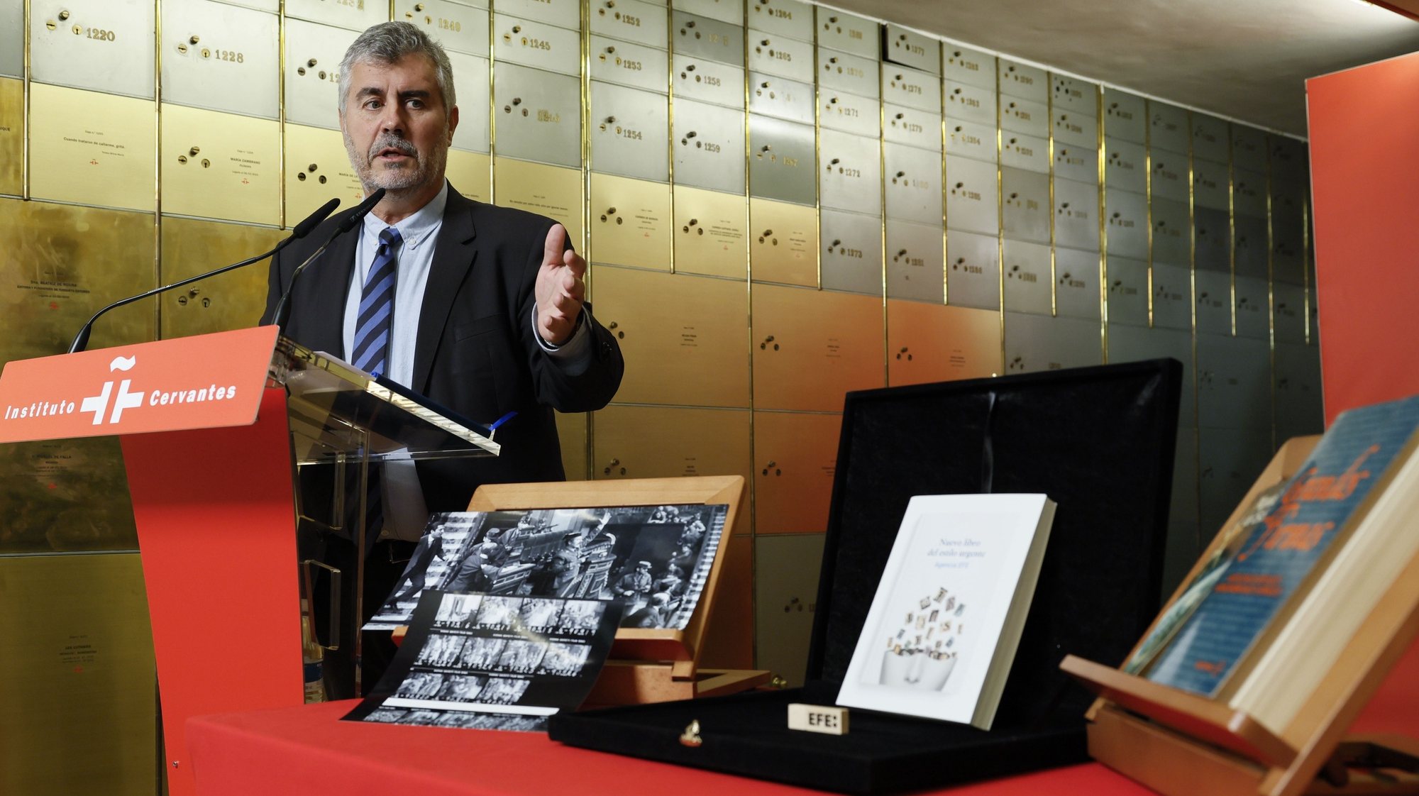 epa11113912 Agencia EFE news agency&#039;s Chairman Miguel Angel Oliver delivers a speech next to the items that will be kept, during the handing in of the Agencia EFE&#039;s legacy to Instituto Cervantes in Madrid, Spain, 30 January 2024. The EFE&#039;s legacy will be kept at one of the safe deposits of The Box of Letters of Instituto Cervantes. Oliver handed in a copy of Agency&#039;s style book, an anthology of famous authors and some photos taken by EFE during the failed coup d&#039;etat attempt in Spain in 1981. The event is held in the framework of the 85th anniversary of foundation of Agencia EFE.  EPA/BALLESTEROS