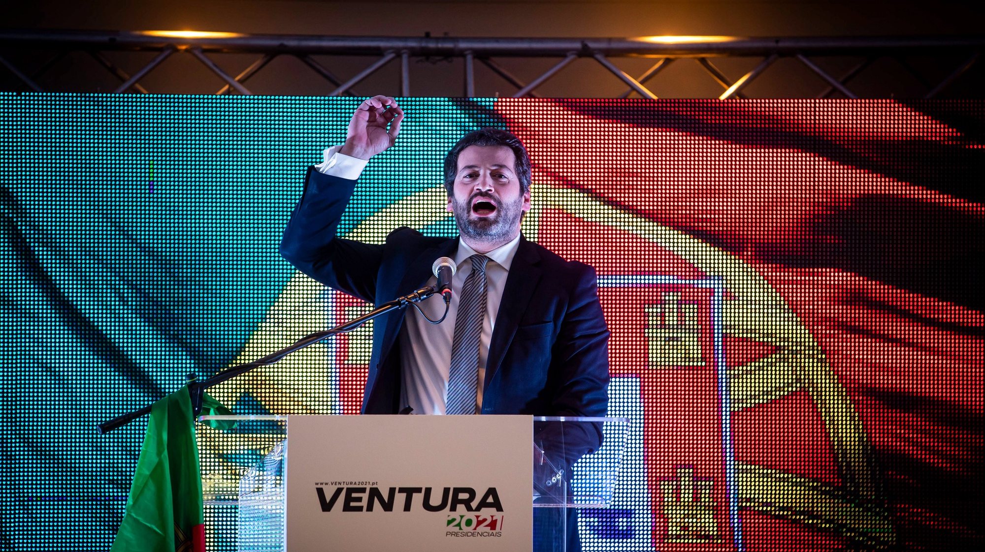 epa08963365 Portuguese presidential candidate for CHEGA party, Andre Ventura (C), addresses supporters after learning the results of the presidential election, at a Hotel in Lisbon, Portugal, 24 January 2021.  EPA/JOSE SENA GOULAO