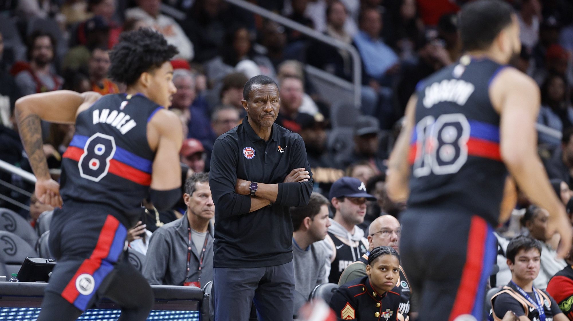 epa10535839 Detroit Pistons head coach Dwayne Casey (C) looks at his players during the first half of the NBA basketball game between the Detroit Pistons and the Atlanta Hawks at State Farm Arena in Atlanta, Georgia, USA, 21 March 2023.  EPA/ERIK S. LESSER  SHUTTERSTOCK OUT