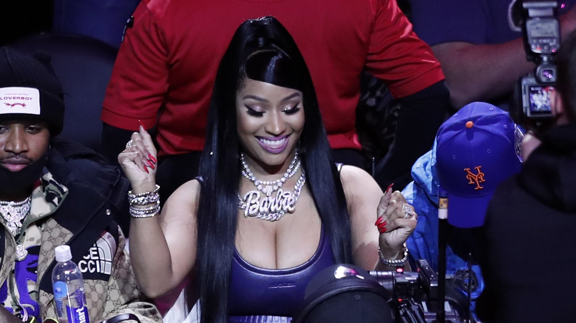 epa09726596 Trinidadian rapper Nicki Minaj (C) attends the NBA game between the Los Angeles Lakers and the Los Angeles Clippers at the Crypto.com Arena in Los Angeles, California, USA, 03 February 2022.  EPA/ETIENNE LAURENT  SHUTTERSTOCK OUT