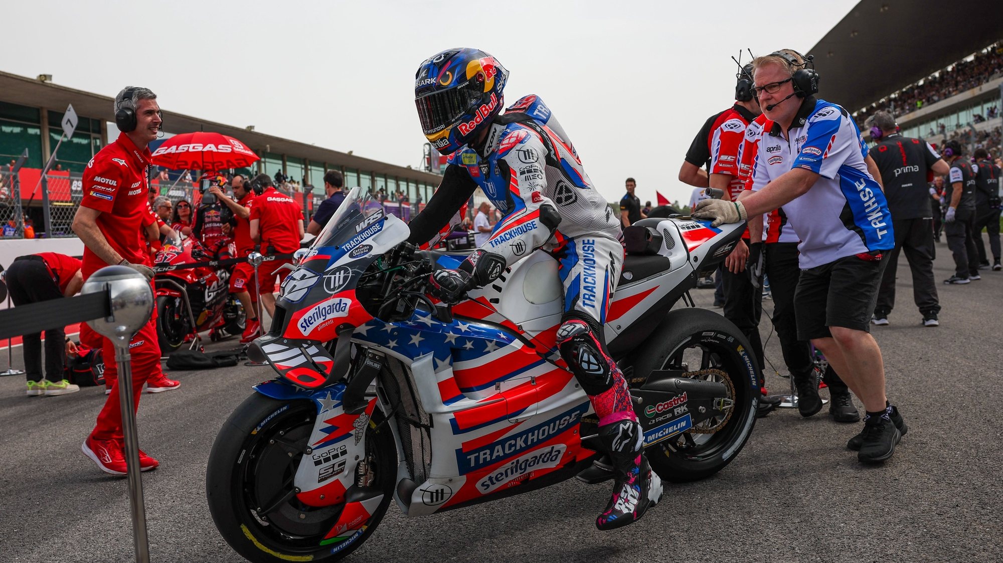 epa11239284 Portugese rider Miguel Oliveira of Trackhouse Racing gets ready for the Sprint Race of the Motorcycling Grand Prix of Portugal, in Portimao, Portugal, 23 March 2024. The 2024 Motorcycling Grand Prix of Portugal is held on 24 March.  EPA/JOSE SENA GOULAO