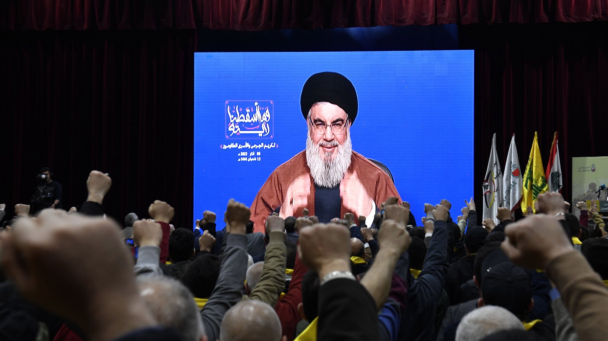 epa10506449 Supporters of Hezbollah listen to a speech by Hezbollah leader Sayyed Hassan Nasrallah delivered on a big screen during a rally to commemorate Hezbollah Wounded Resistance Day in the southern suburb of Beirut, Lebanon, 06 March 2023. Nasrallah said Hezbollah supports the nomination of the Head of the Marada Movement Sleiman Franjiyeh for the Lebanese presidency. President Michel Aoun&#039;s term has ended in late October, since then the Lebanese Parliament has failed 11 times to elect a president.  EPA/WAEL HAMZEH / POOL