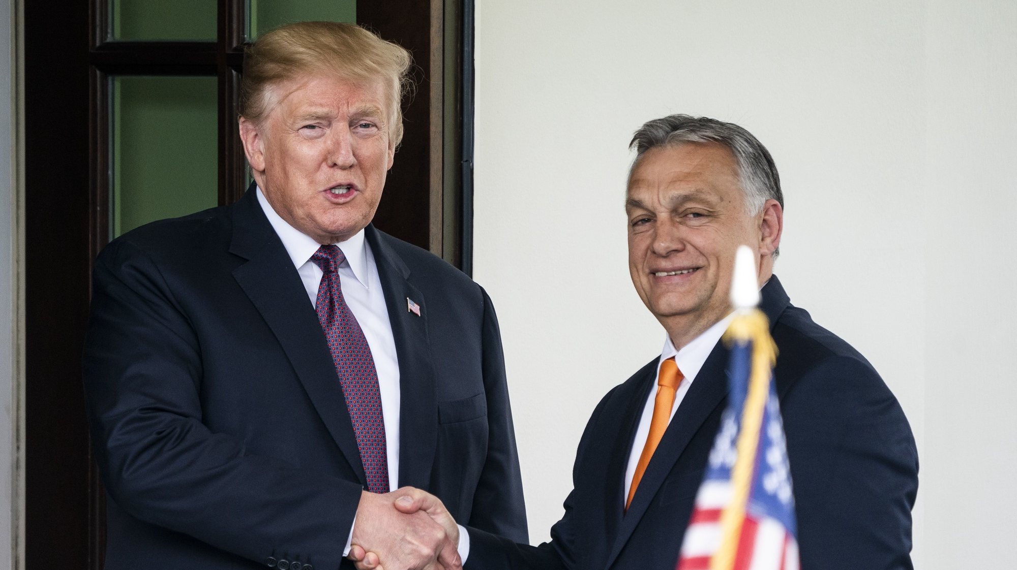 epaselect epa07567885 US President Donald J. Trump (L) welcomes Hungarian Prime Minister Viktor Orban (R) to the White House in Washington, DC, USA, 13 May 2019. Their meeting marks the first time a US president has granted Orban a formal visit in more than 20 years.  EPA/JIM LO SCALZO