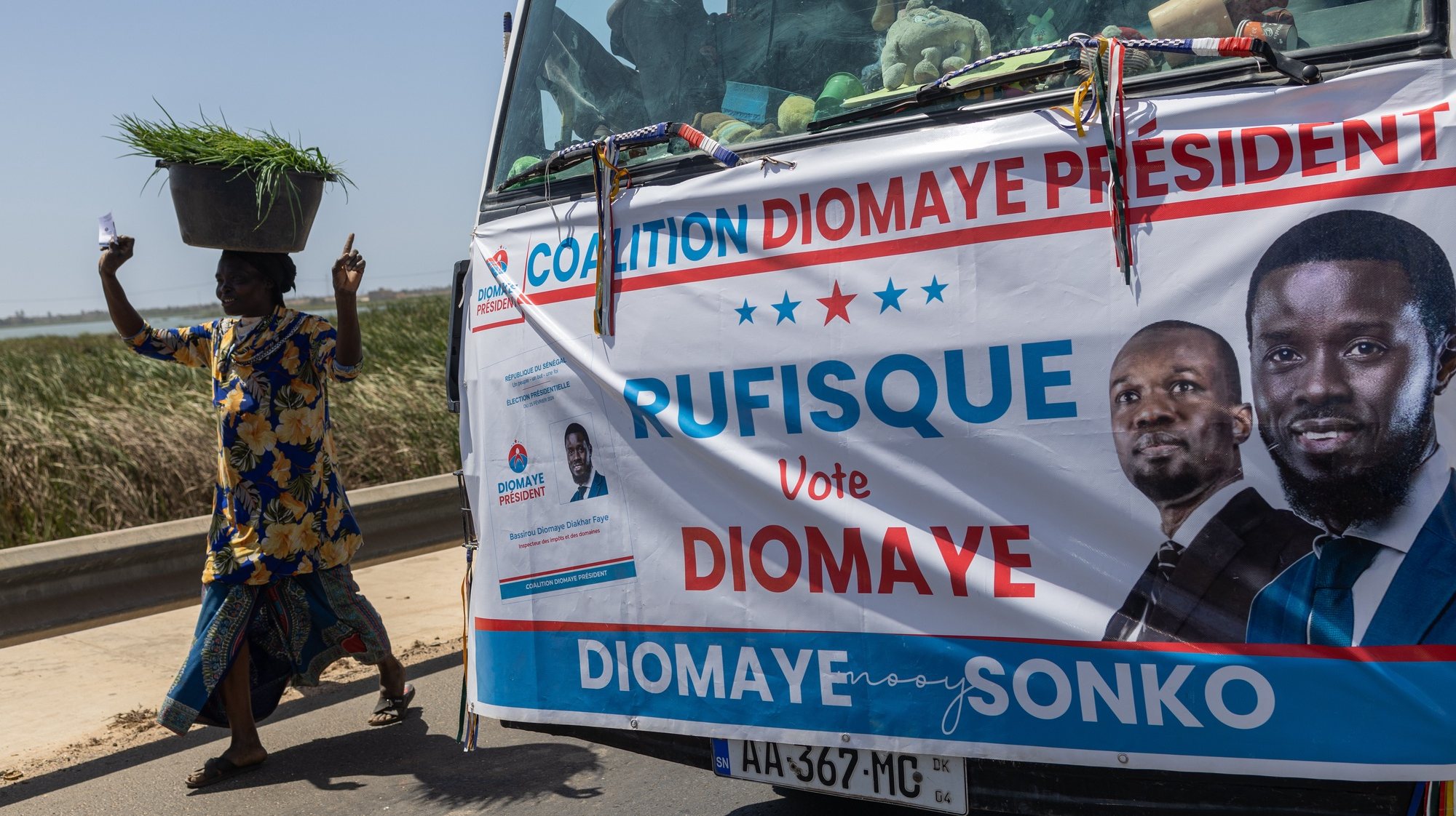 epa11216861 Supporters of opposition presidential candidate Bassirou Diomaye Faye take part in a campaign caravan to drum up support for Faye in Tivaouane Peulh, Senegal, 12 March 2024. Faye, of the dissolved party PASTEF (African Patriots of Senegal for Work, Ethics and Fraternity), is running in place of jailed Senegalese opposition Ousmane Sonko. Sonko and Faye are currently in prison, but Faye could be freed according to a recently passed amnesty law for political prisoners. The presidential election will take place on 24 March.  EPA/JEROME FAVRE
