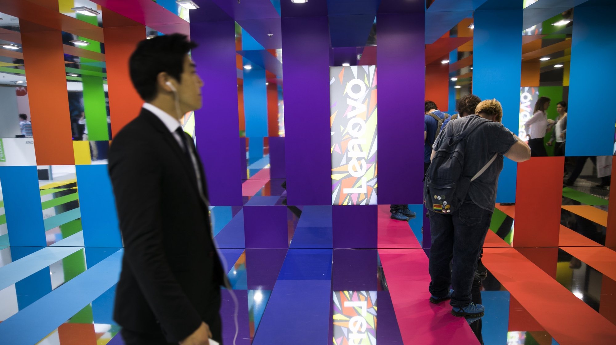 epa06177117 Visitors walks trough he passage of Lenovo company at the Internationale Funkaustellung Berlin (IFA), an international consumer electronics fair, in Berlin, Germany, 01 September 2017. The IFA is the world&#039;s leading trade show for consumer electronics and home appliances and is open for the general public from 01 to 06 September. The fair presents over 1800 exhibitors from more than 50 countries and is expected to be visited by more than 200.000 visitors this year.  EPA/CARSTEN KOALL