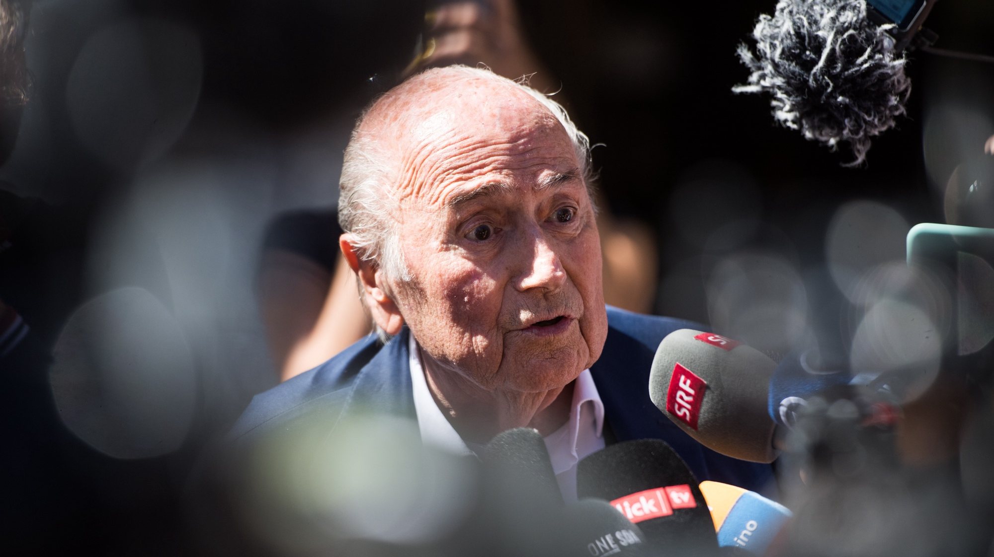 epaselect epa10058873 The former FIFA President, Joseph Blatter (C) surrounded by media representatives, speaks to the press in front of the Swiss Federal Criminal Court after the verdict has been announced, in Bellinzona, Switzerland, 08 July 2022. The trial ended with an acquittal. Former FIFA President Joseph Blatter and former UEFA president Michel Platini, stood trial before the Federal Criminal Court over a suspicious two-million payment. The Federal Prosecutor&#039;s Office accused them of fraud. The defense spoke of a conspiracy.  EPA/ALESSANDRO CRINARI