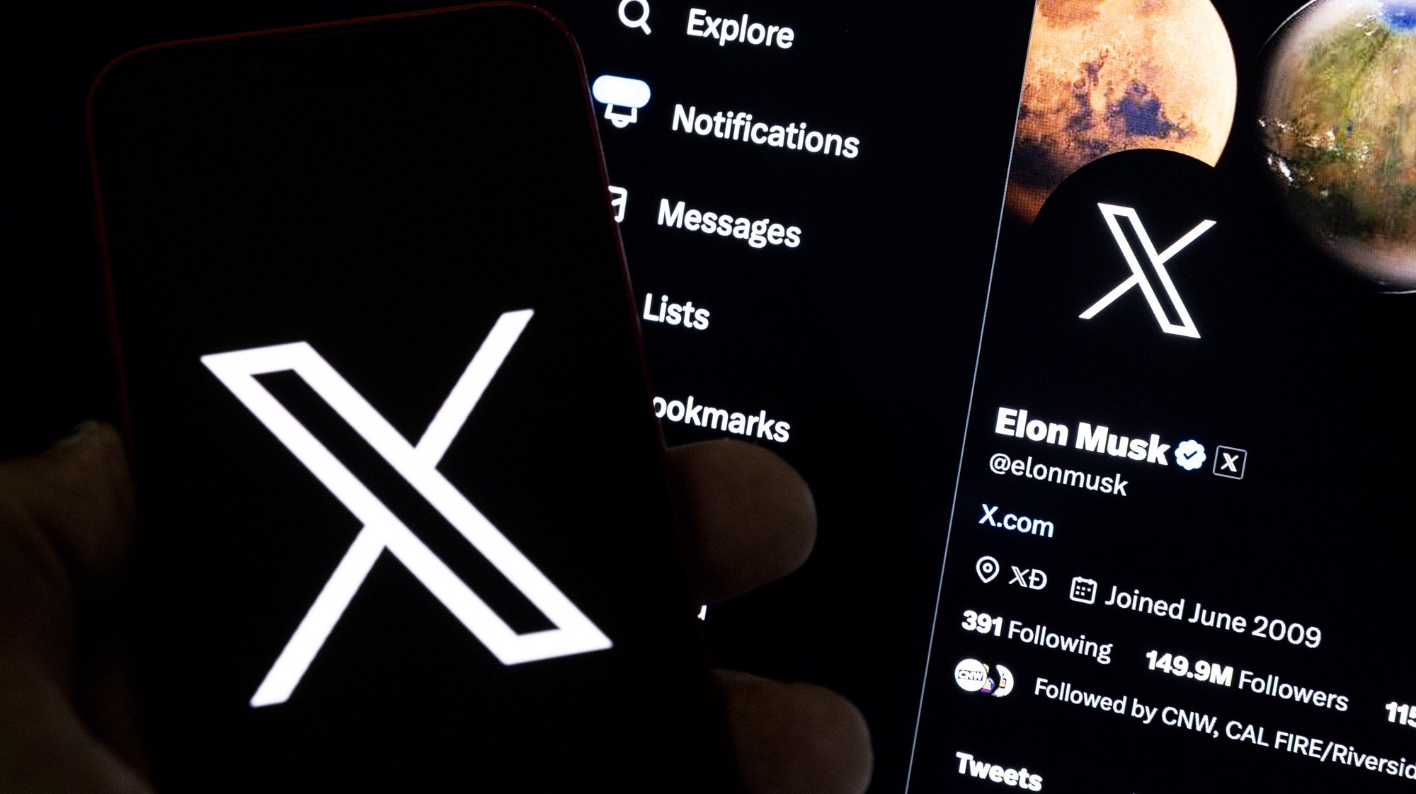 epa10772473 An illustration pictures shows a user holding a mobile phone displaying the &#039;X&#039; logo in front of Elon Musk&#039;s page in Los Angeles, California, USA, 27 July 2023. Twitter announced on 23 July that it will rebrand to X.  EPA/ETIENNE LAURENT