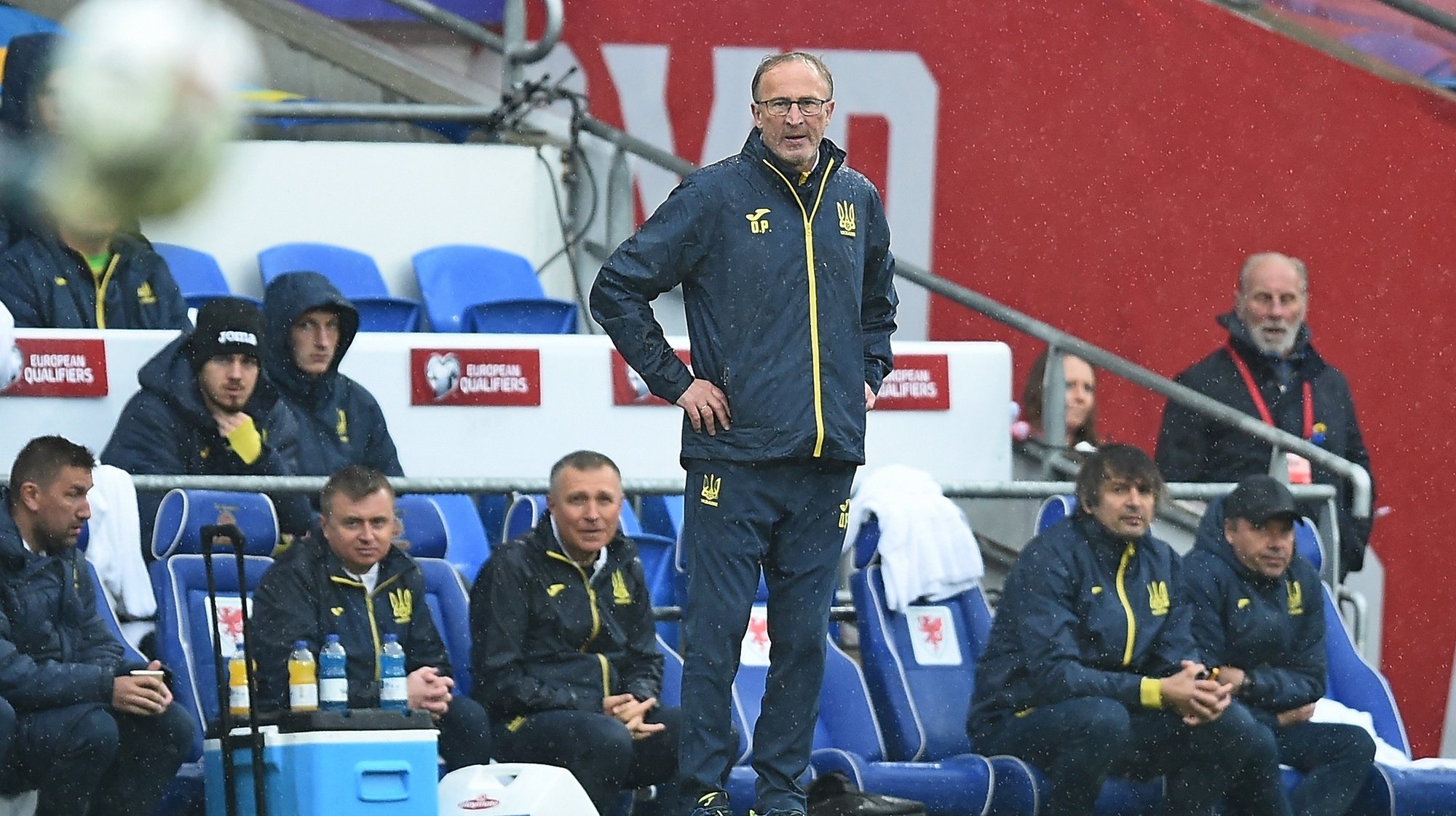 epa09997759 Ukraine head coach Olexandr Petrakov (C) reacts during the FIFA World Cup 2022 qualification playoff final soccer match between Wales and Ukraine in Cardiff, Wales, Britain, 05 June 2022.  EPA/Peter Powell